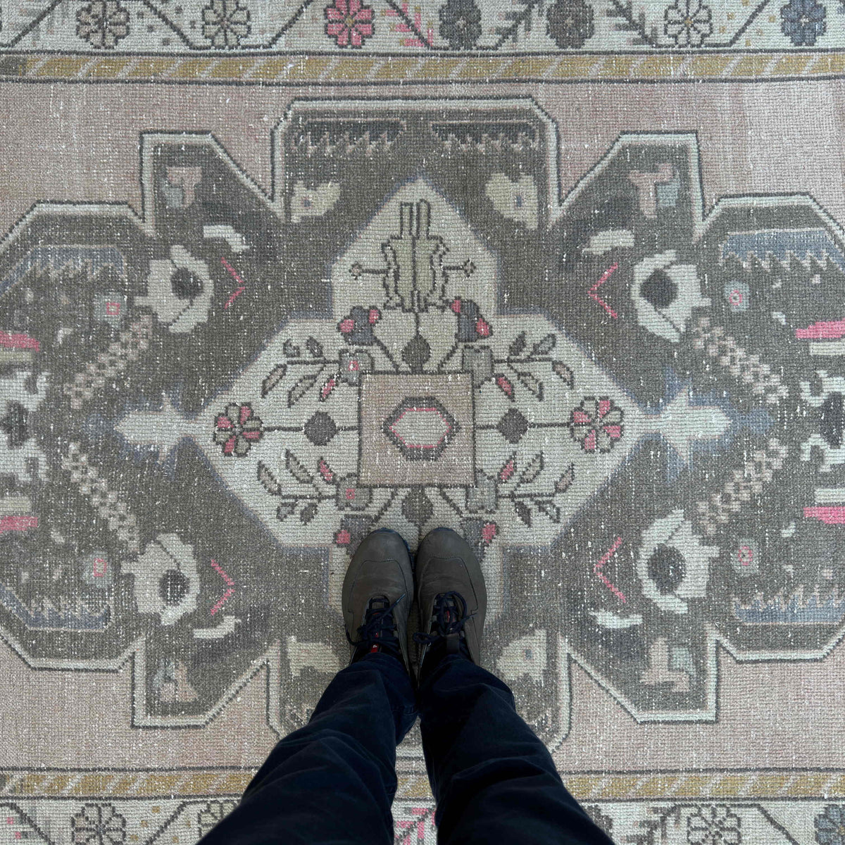 1970s pink vintage Turkish area rug with traditional design, hand-knotted weave and low pile.