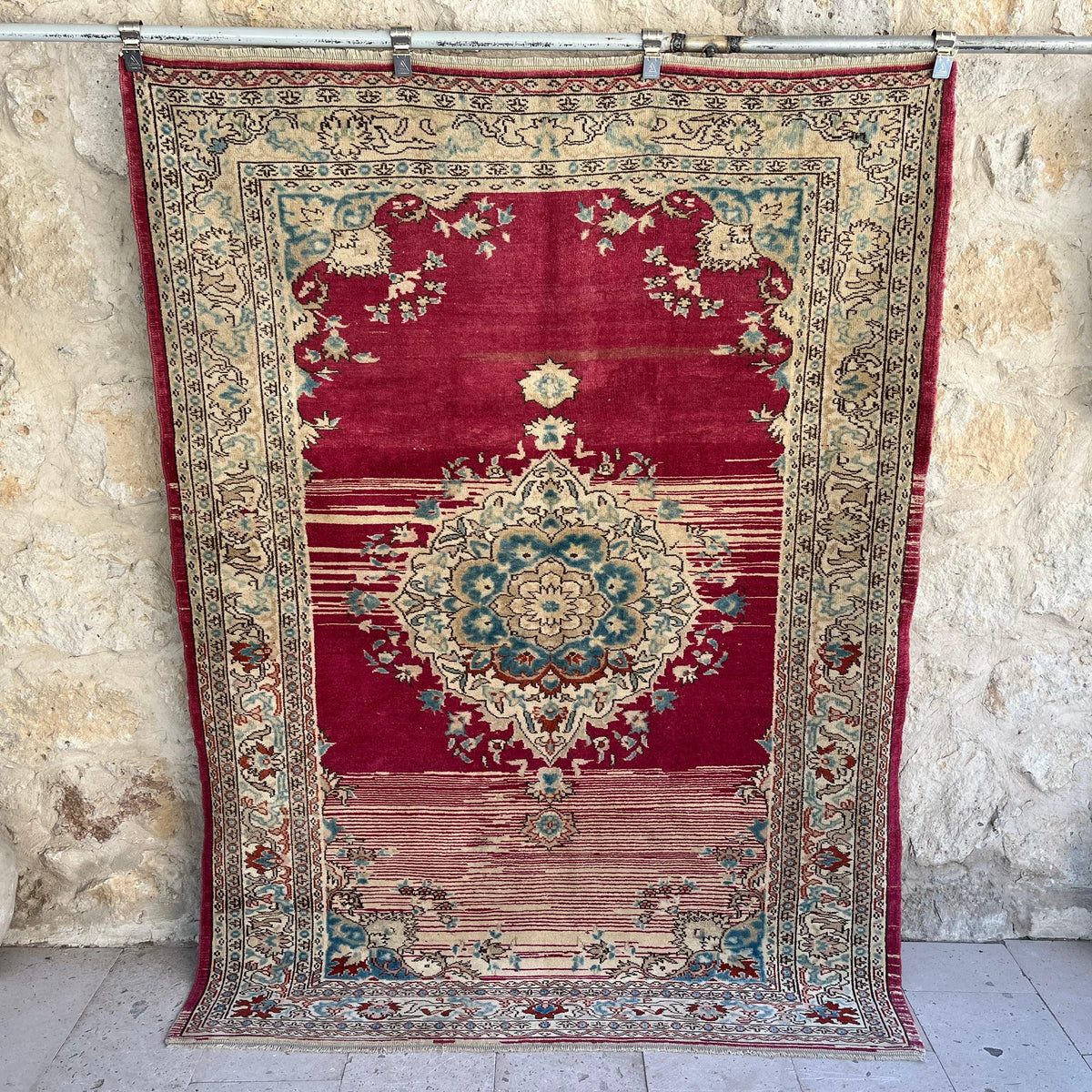 Red 5' x 7' vintage distressed rug with medallion design, handmade in Turkey – Libby.