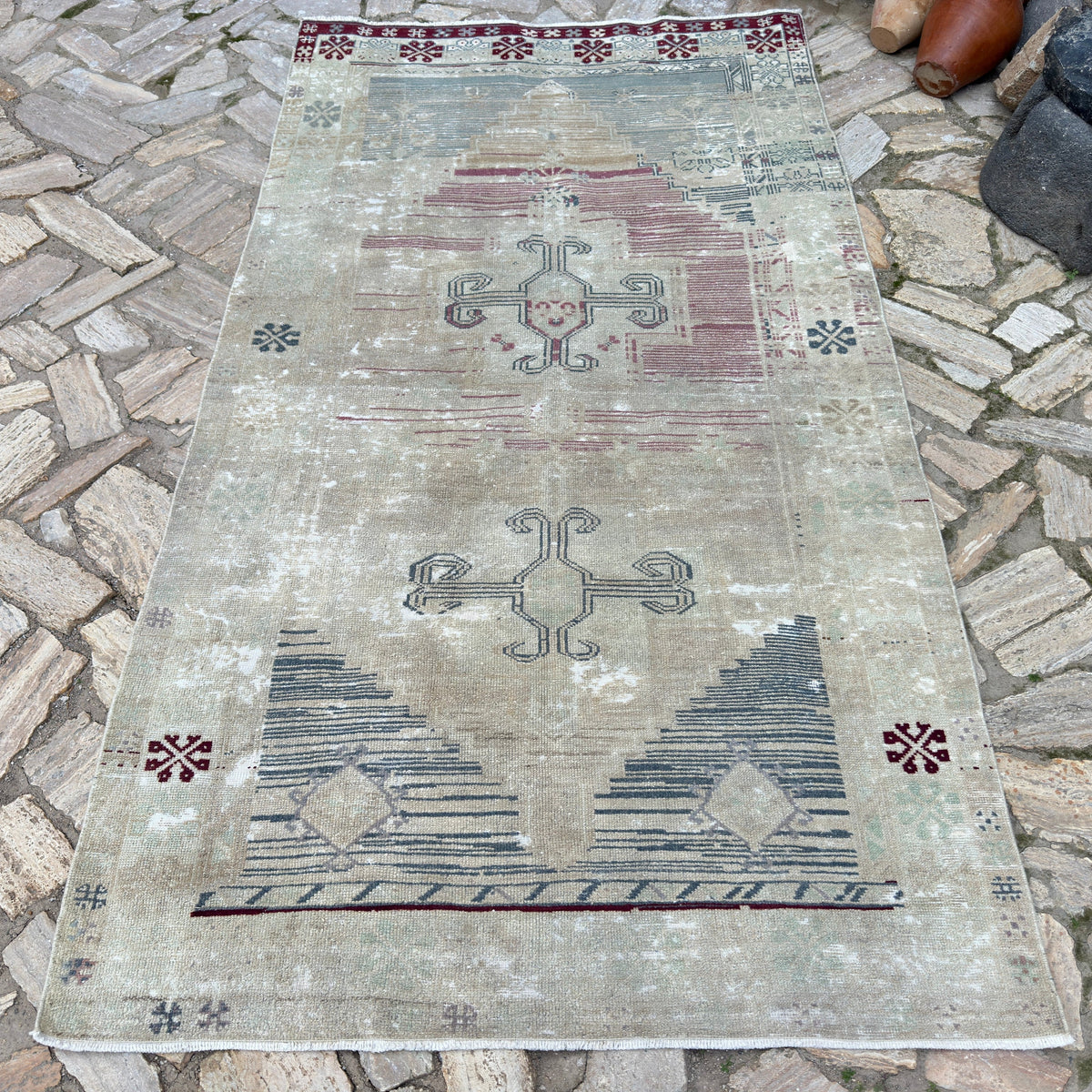 Blue 5' x 8' vintage Turkish distressed rug in wool and cotton, shown on the floor.
