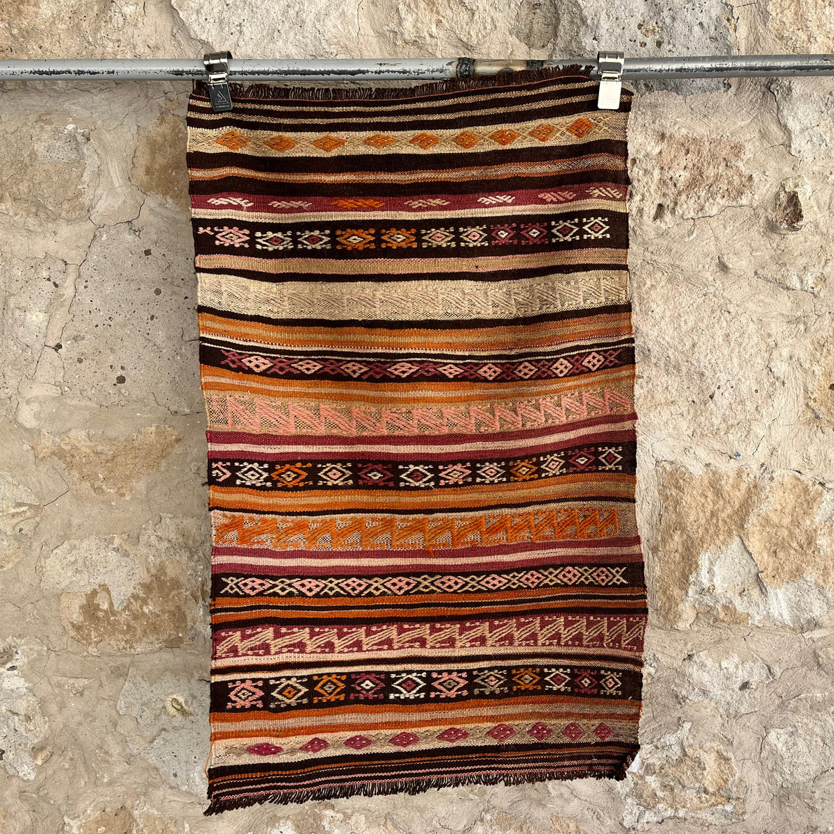 Orange 2' x 4' vintage flatweave rug with striped design, handmade in Turkey – Paterson.
