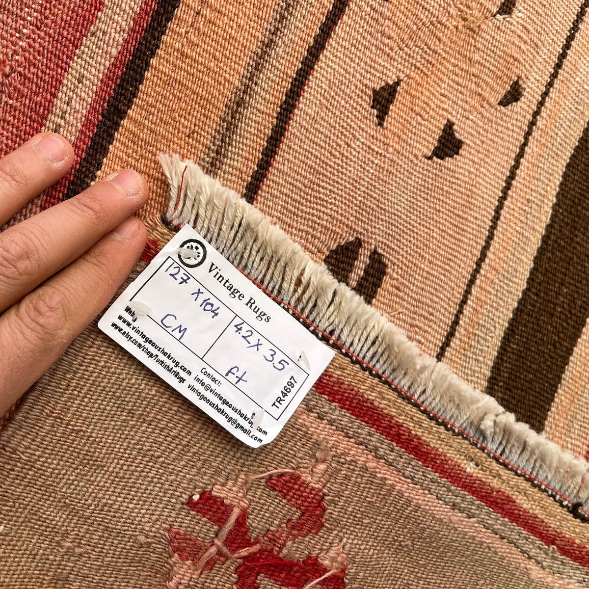 1970s red vintage Turkish flatweave rug with traditional design, flatweave construction and low pile.