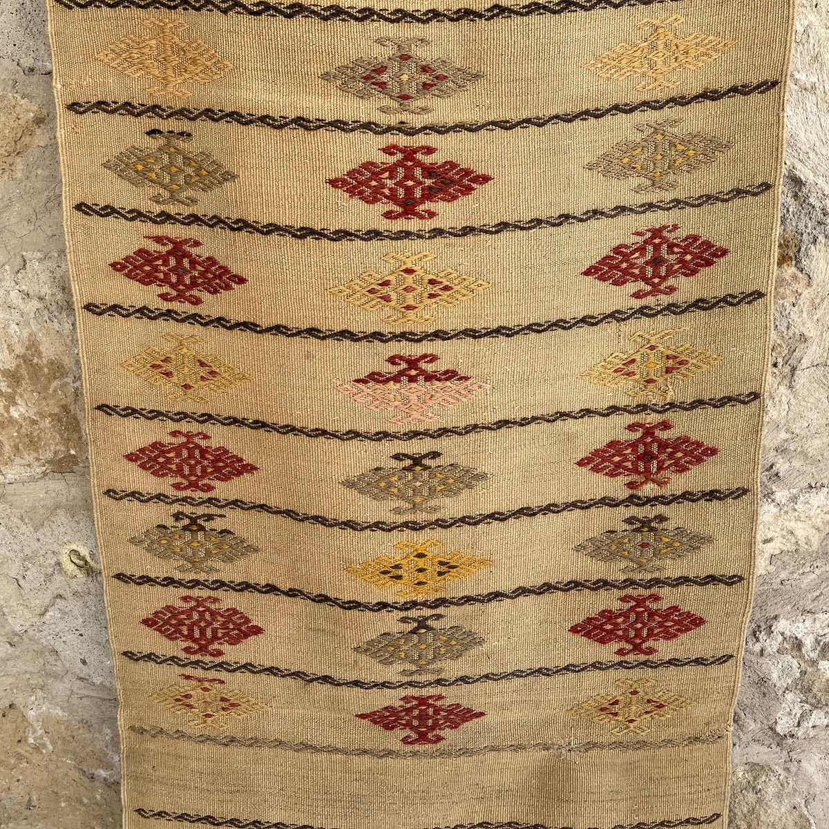 Beige 2' x 8' vintage Turkish flatweave runner rug in wool and cotton, shown on the floor.