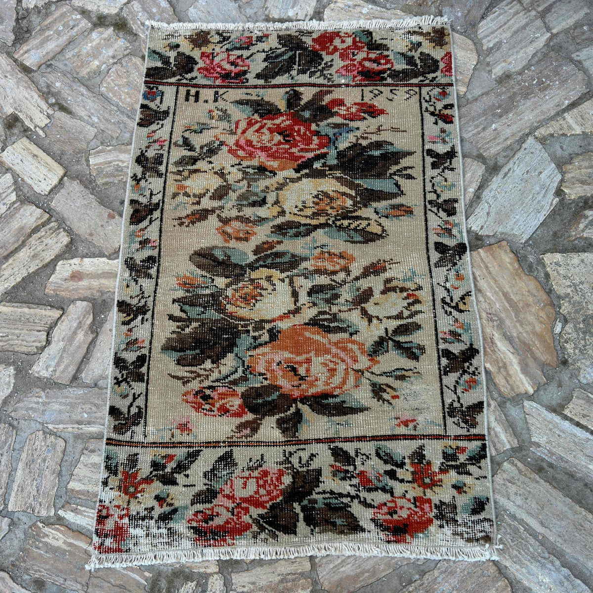 Beige 3' x 4' vintage Turkish floral rug in wool and cotton, shown on the floor.