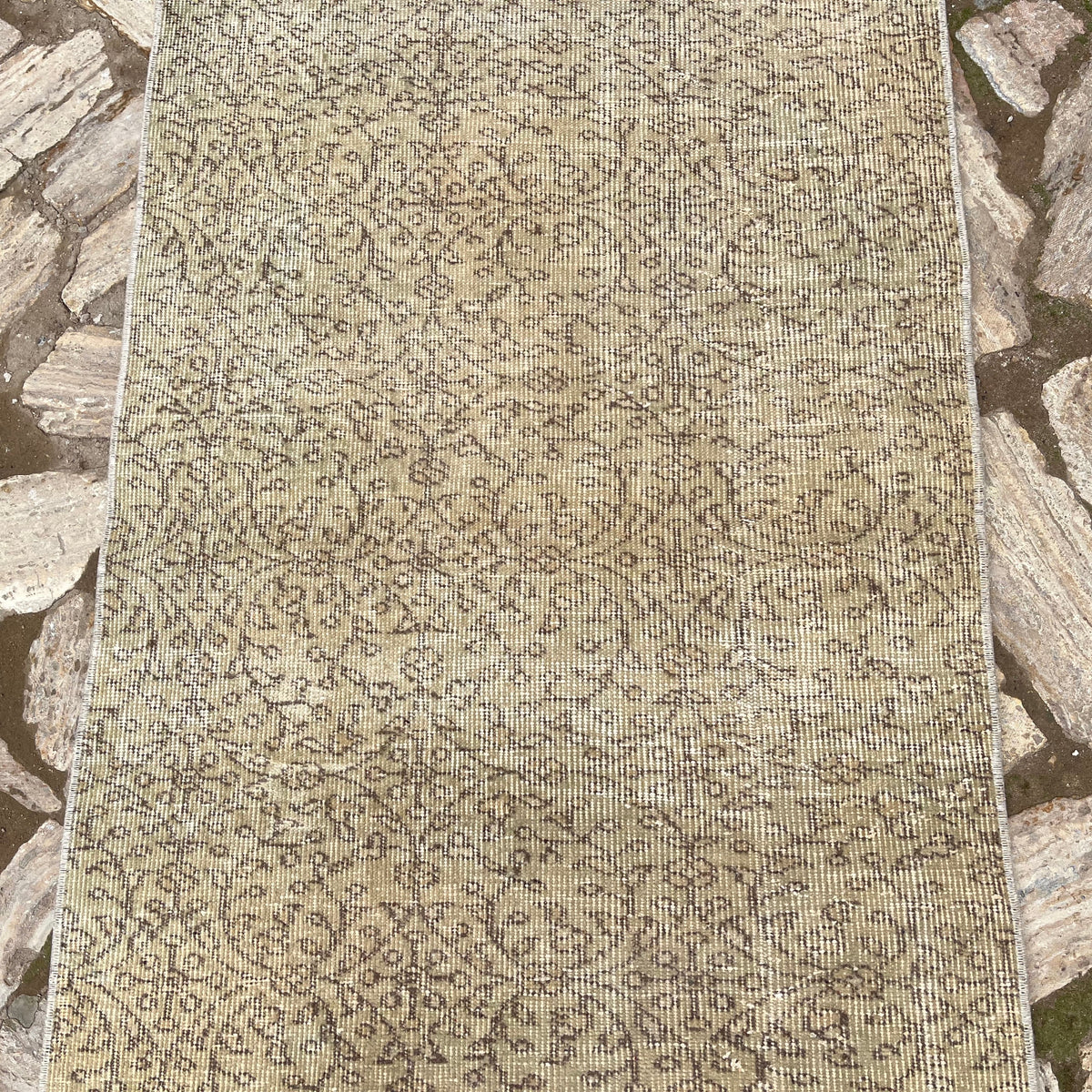 1970s beige vintage Turkish floral runner rug with floral design, hand-knotted weave and low pile.