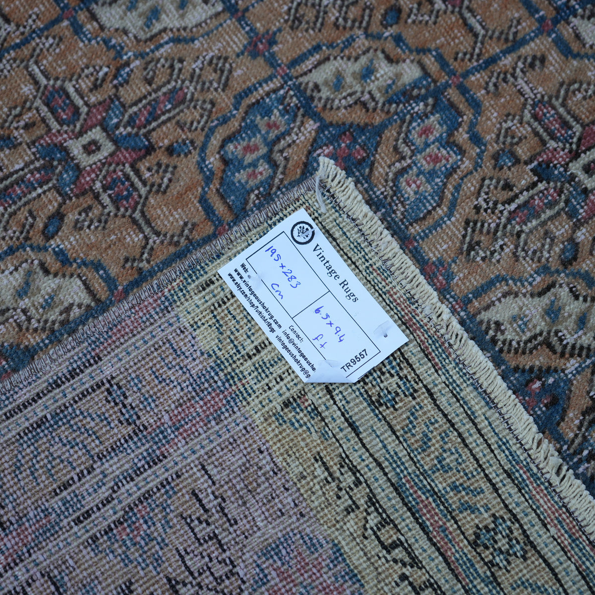 Pale Orange 6' x 9' vintage Turkish geometric rug from the 1970s with geometric design.