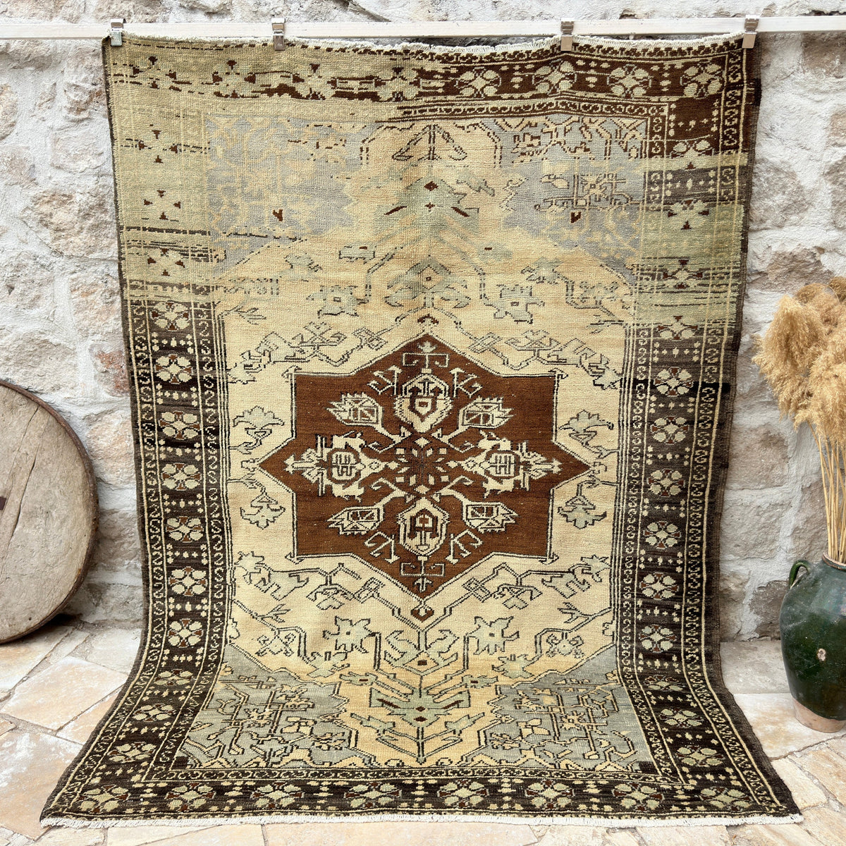Brown 7' x 9' vintage geometric rug with medallion design, handmade in Turkey – Pollard.