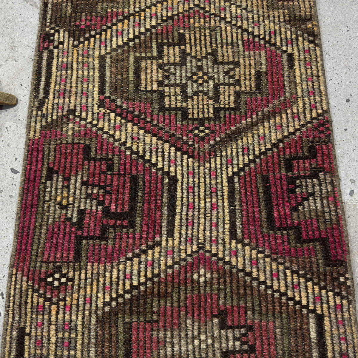 1970s pink vintage Turkish kilim rug with traditional design, hand-knotted weave and low pile.