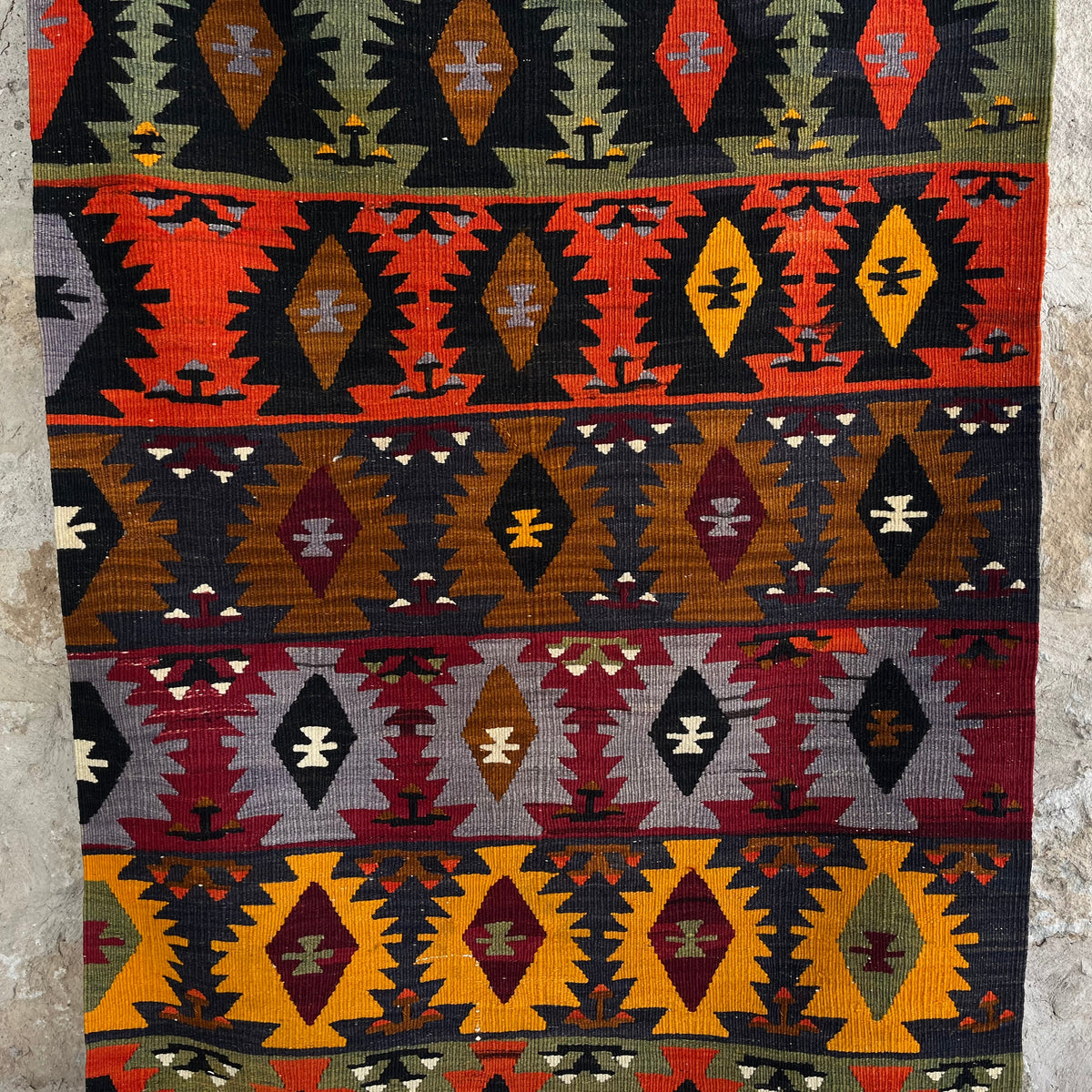 Red 3' x 6' vintage Turkish kilim rug in wool and cotton, shown on the floor.