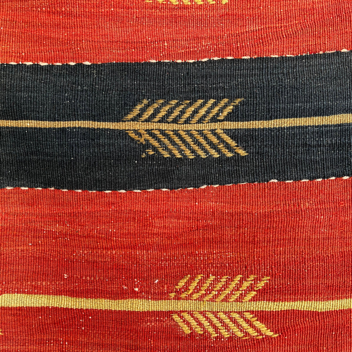Close-up of the blue vintage Turkish kilim rug showing striped details, flatweave construction, wool and cotton and low pile.