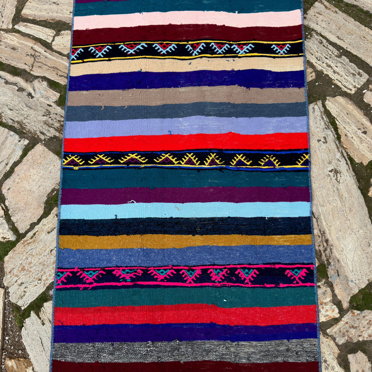 1970s blue vintage Turkish kilim runner rug with striped design, flatweave construction and low pile.