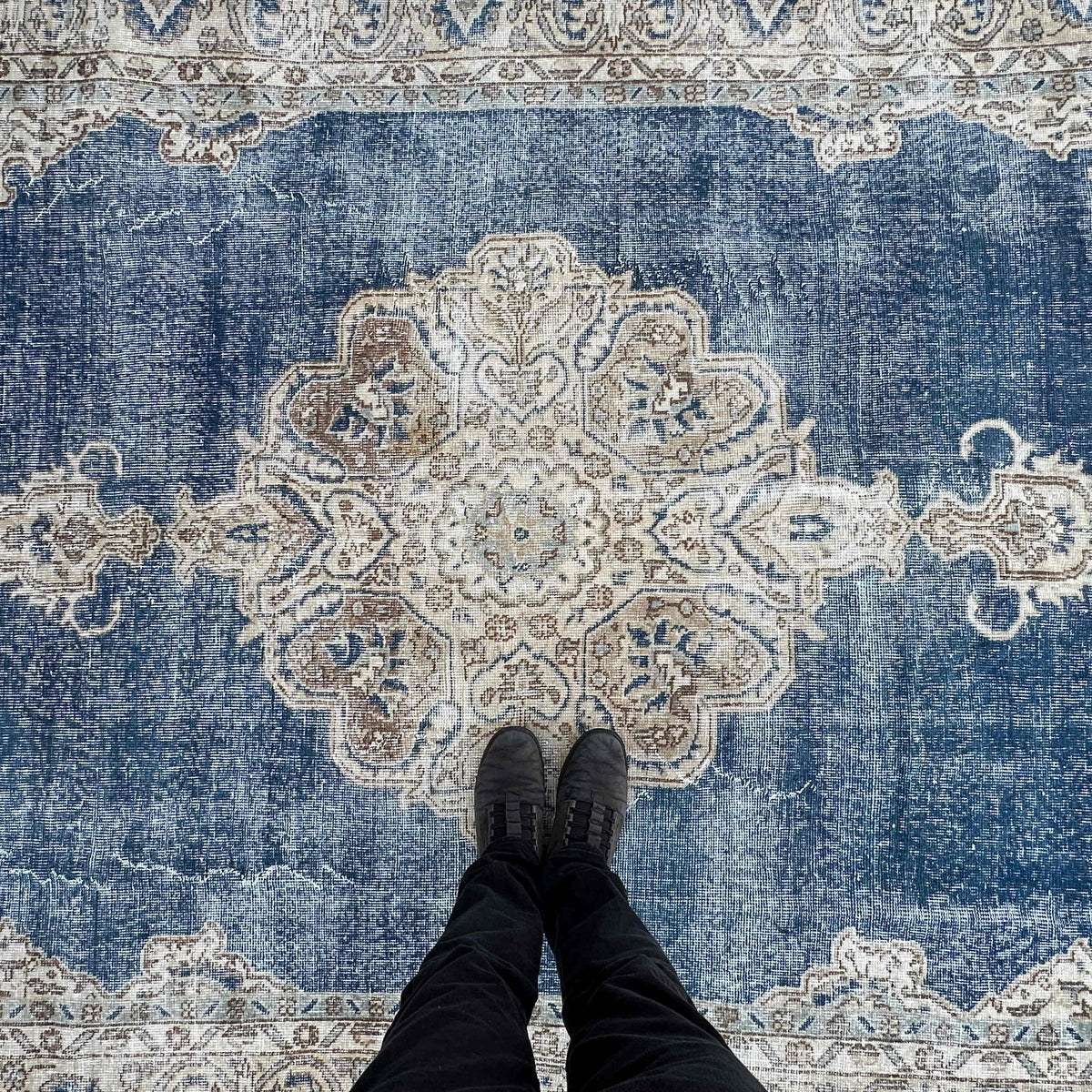 1970s blue vintage Turkish large rug with medallion design, hand-knotted weave and low pile.