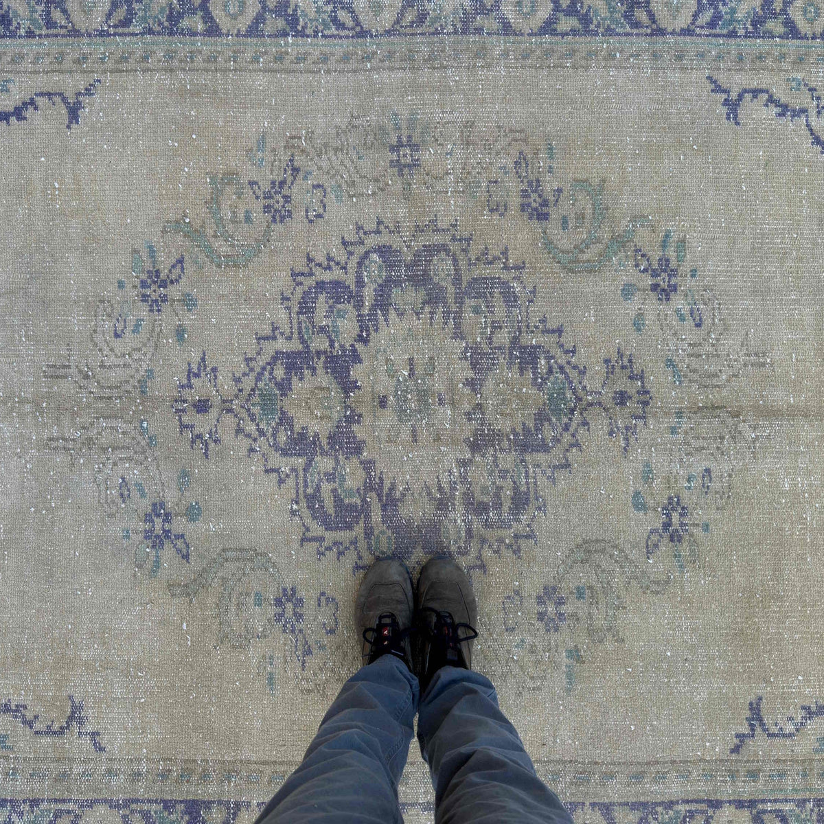 1970s blue vintage Turkish medallion rug with neutral design, hand-knotted weave and low pile.