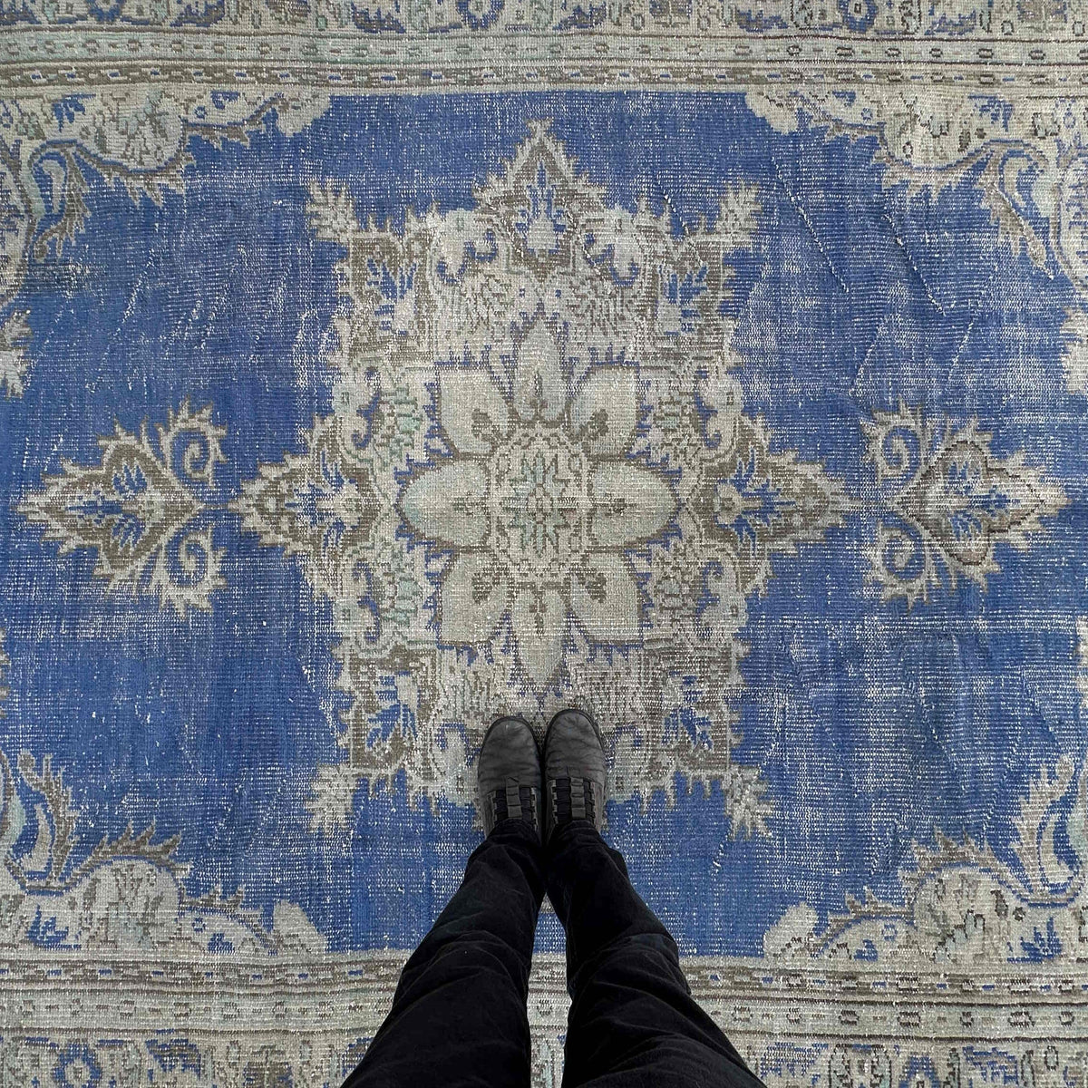 1970s blue vintage Turkish medallion rug with medallion design, hand-knotted weave and low pile.