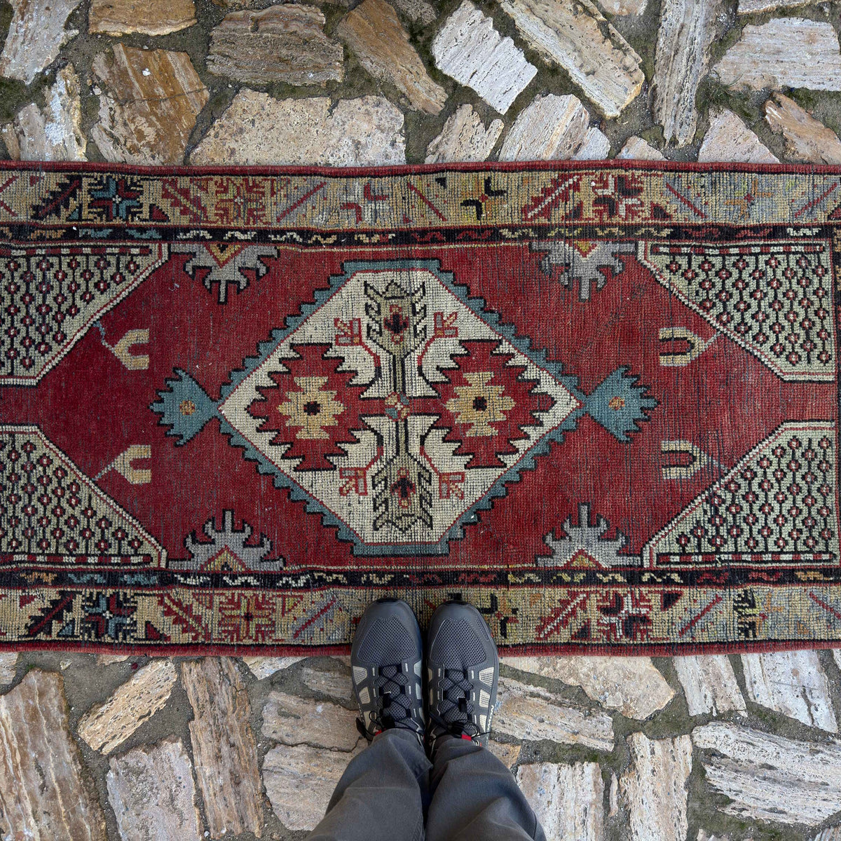 1970s red vintage Turkish medium size rug with medallion design, hand-knotted weave and low pile.