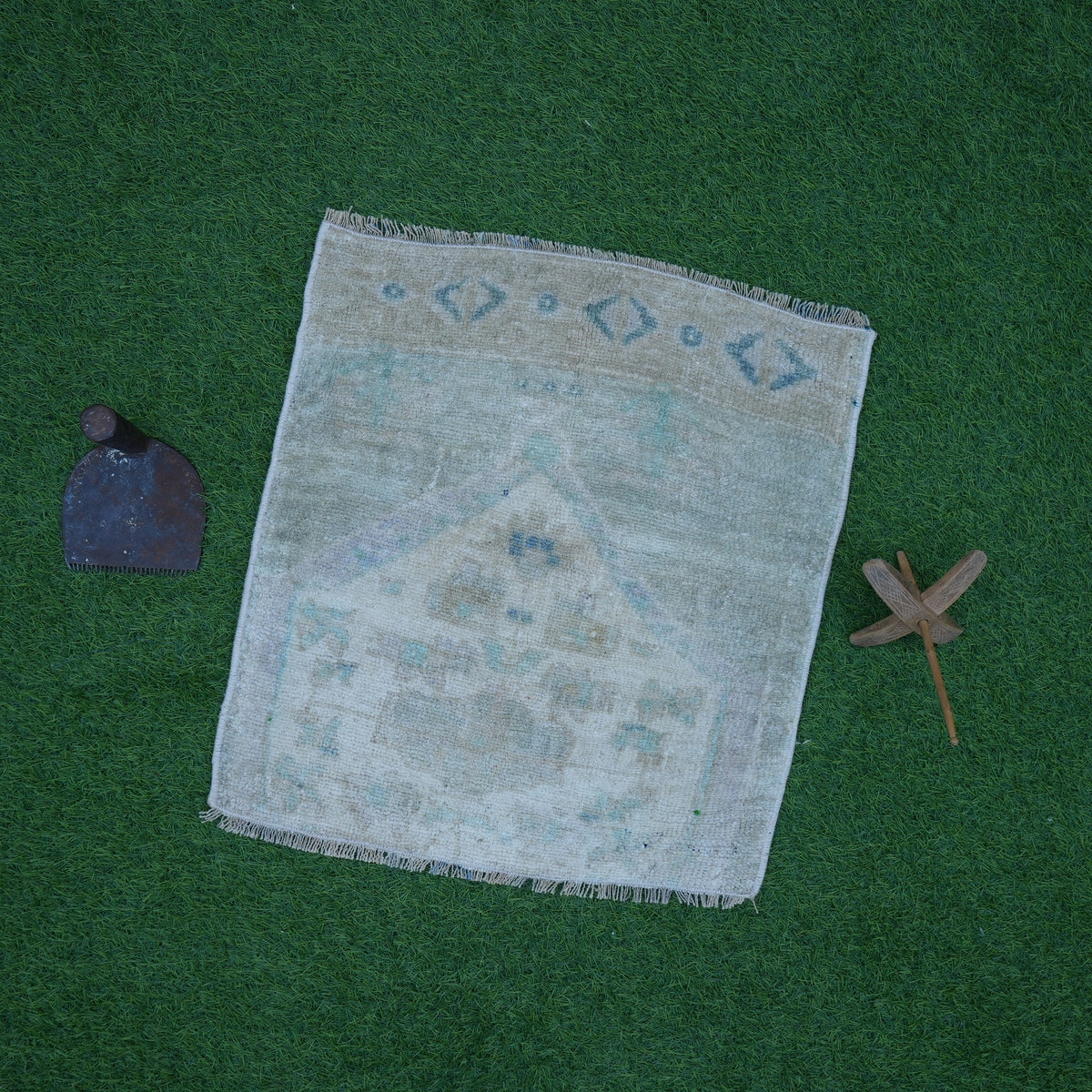Beige 2' x 2' vintage mini rug with traditional design, handmade in Turkey – Denis.