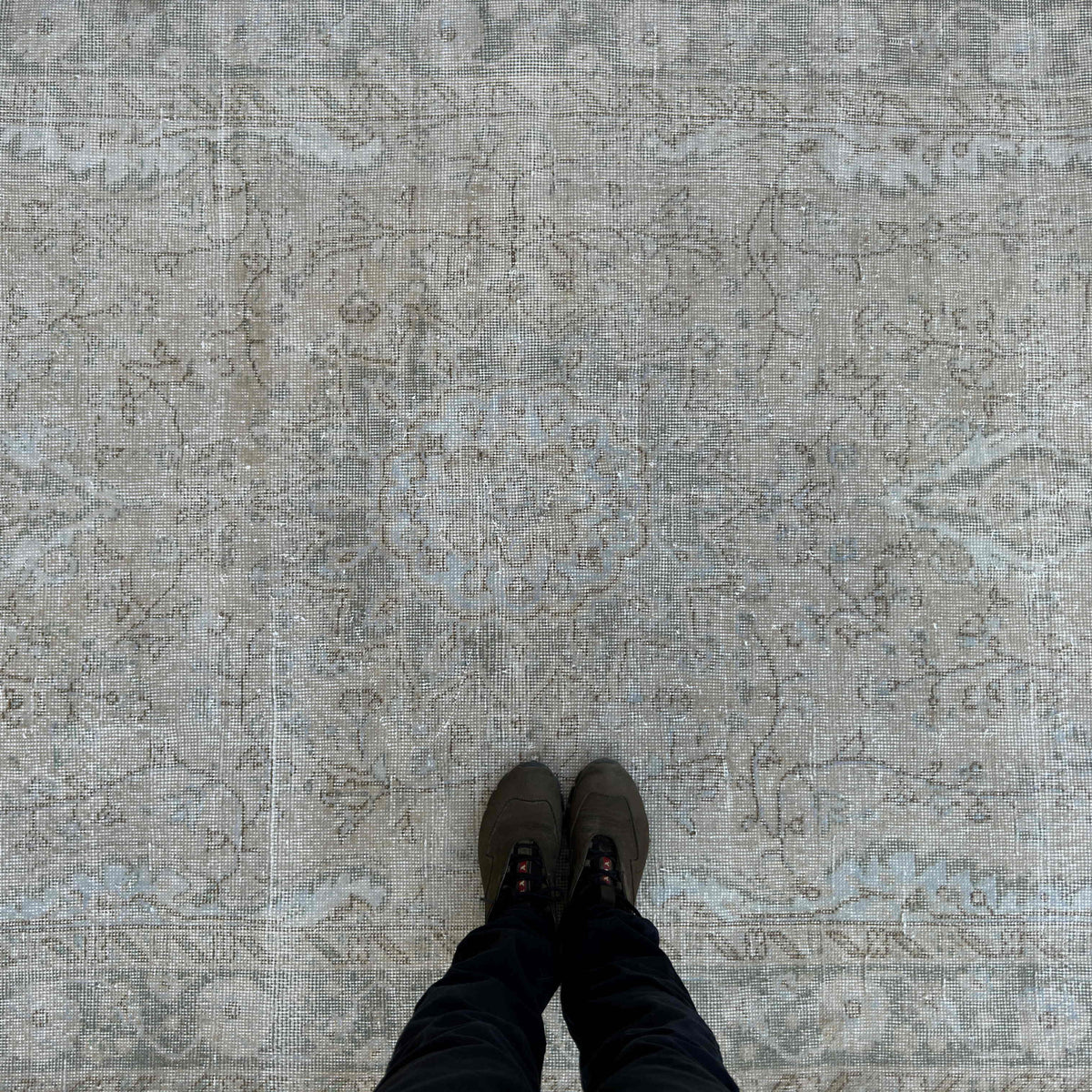 1970s beige vintage Turkish muted rug with neutral design, hand-knotted weave and low pile.