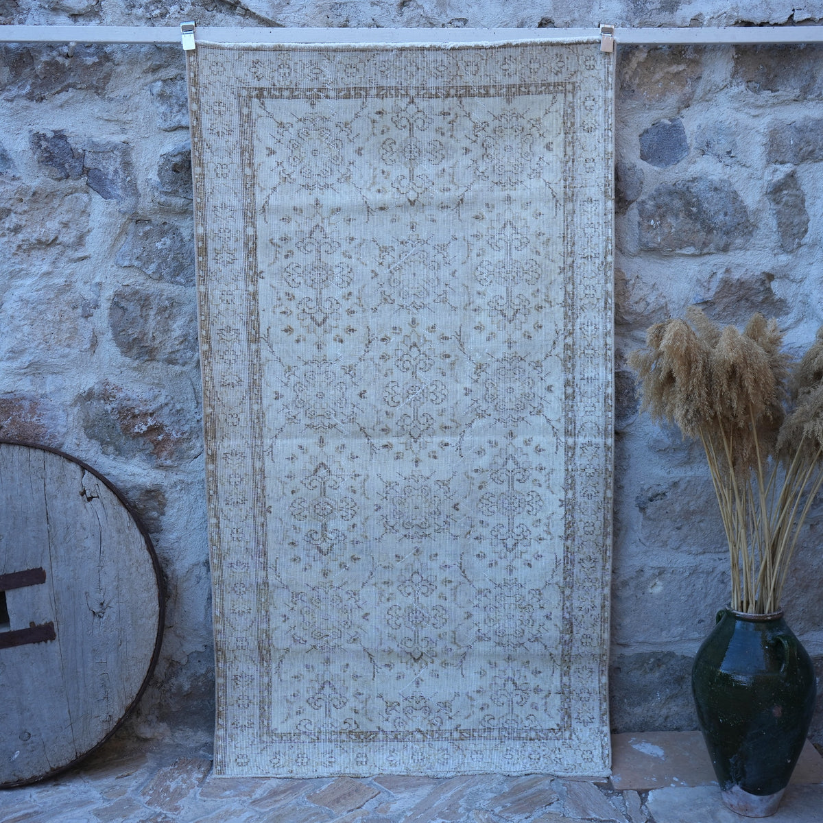 Beige 4' x 7' vintage neutral rug with floral design, handmade in Turkey – Shell.