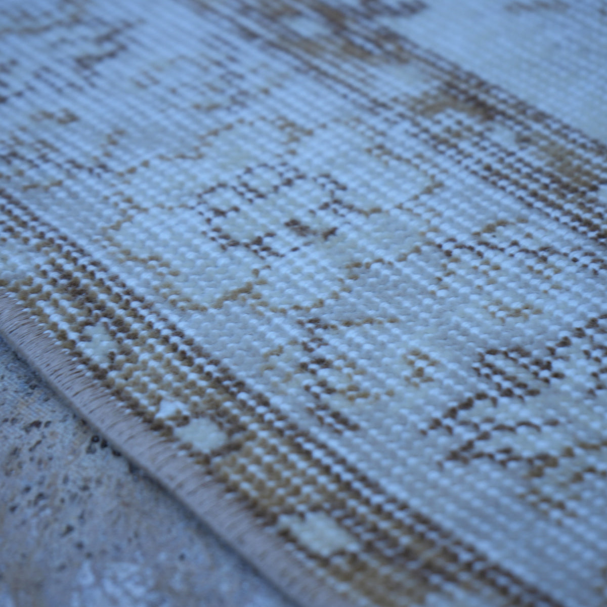 Beige 4' x 7' vintage Turkish neutral rug in wool and cotton, shown on the floor.