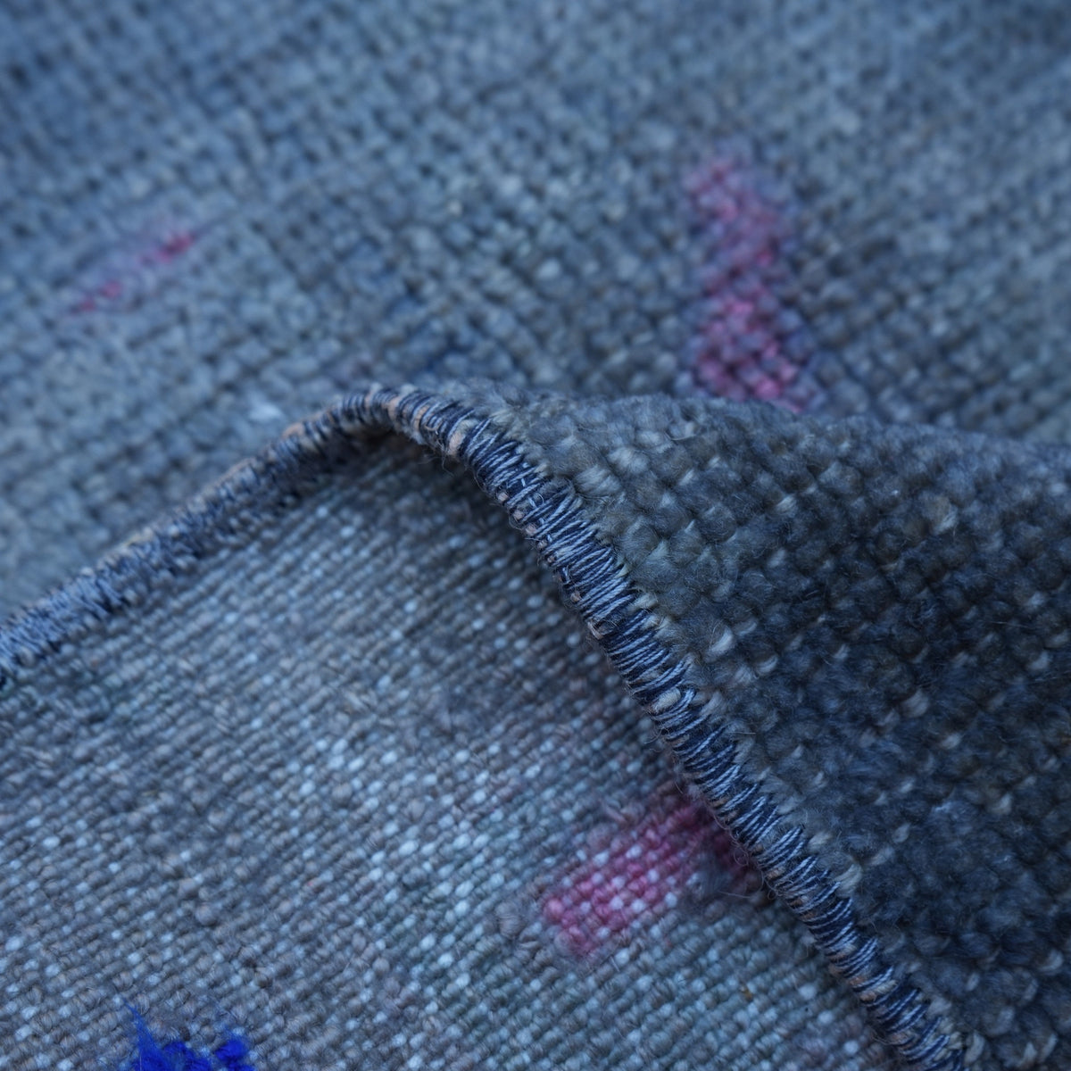 Additional view of the black vintage Turkish overdyed rug, hand-knotted in wool and cotton.