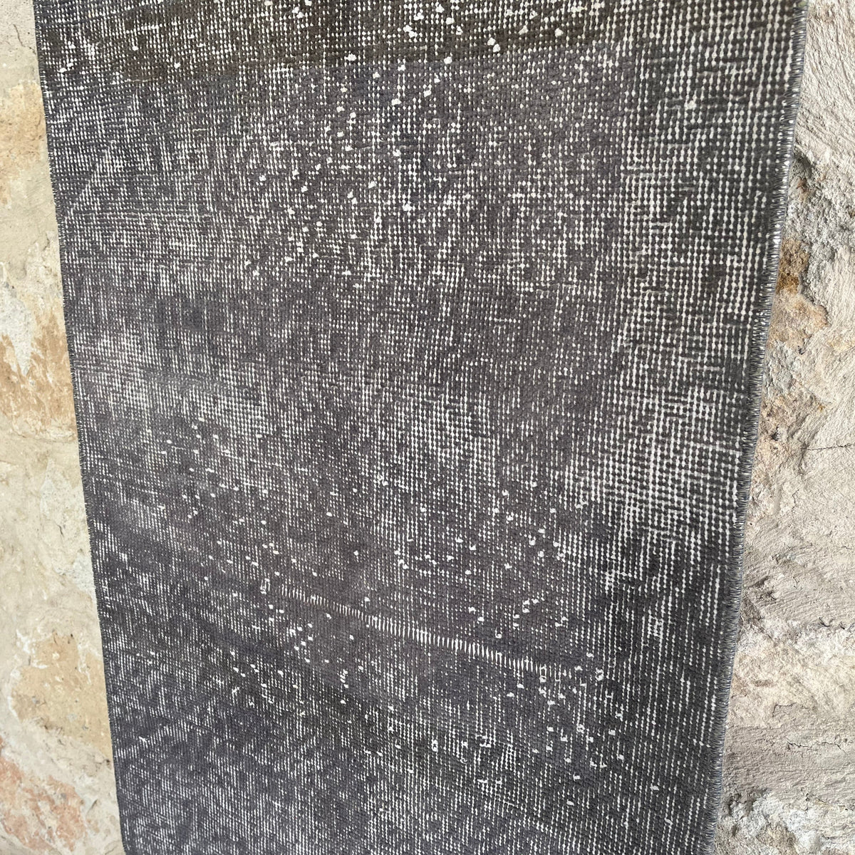 1970s gray vintage Turkish overdyed runner rug with overdyed design, hand-knotted weave and low pile.