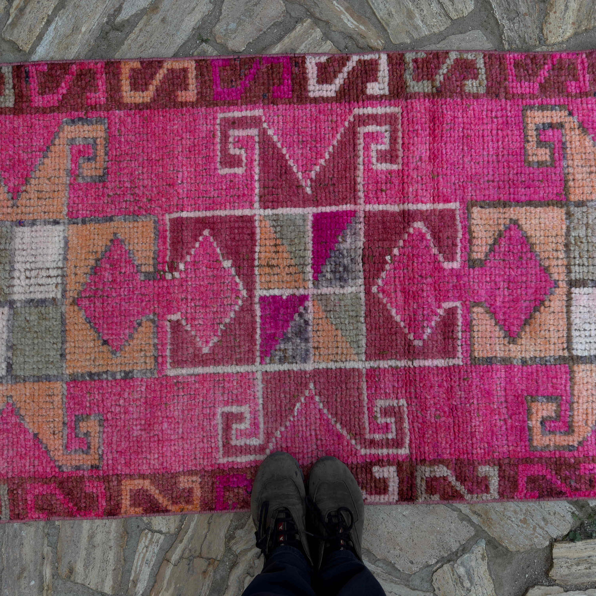 1970s pink vintage persian runner rug with traditional design, hand-knotted weave and low pile.