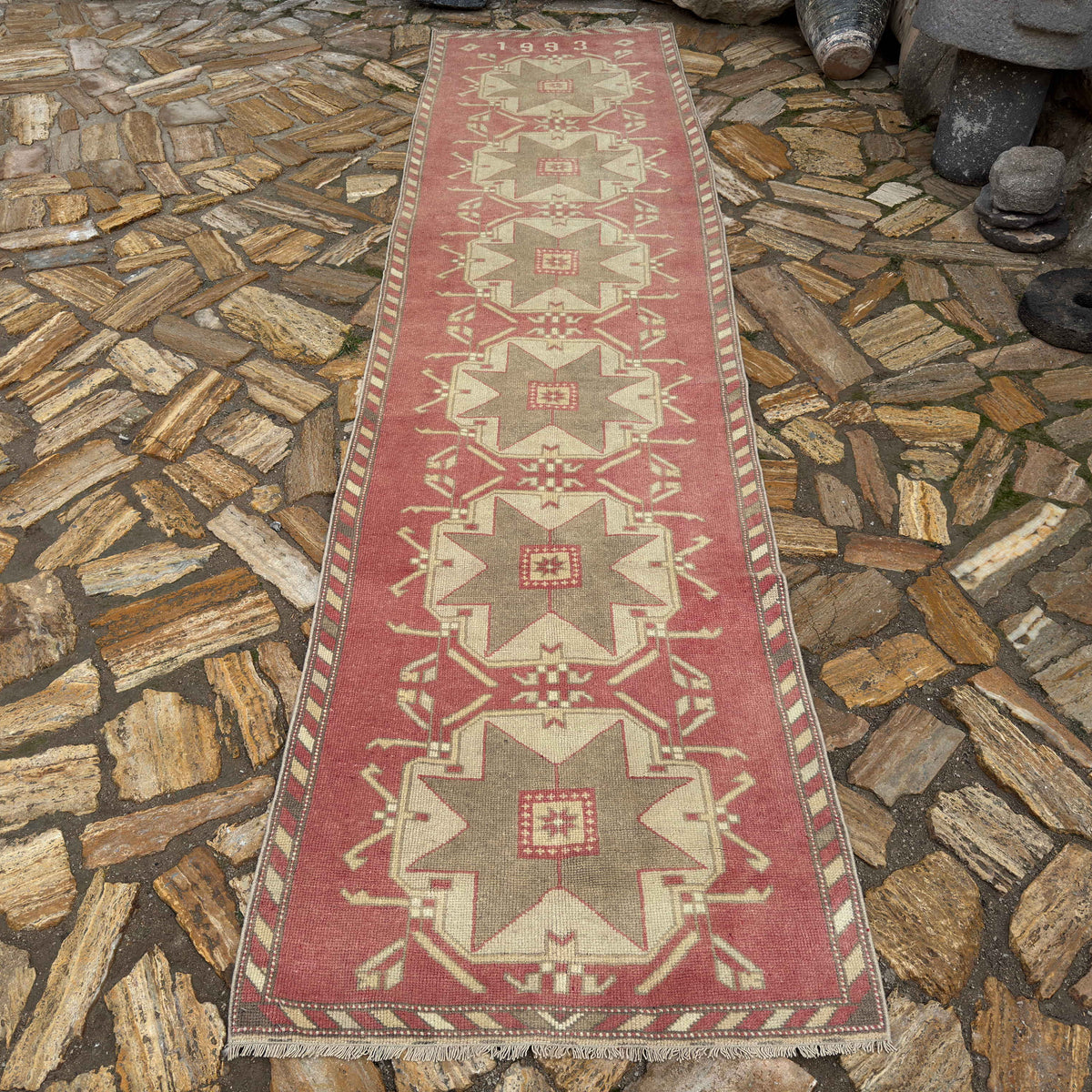 Pale Red 3' x 12' vintage Turkish runner carpet in wool and cotton, shown on the floor.