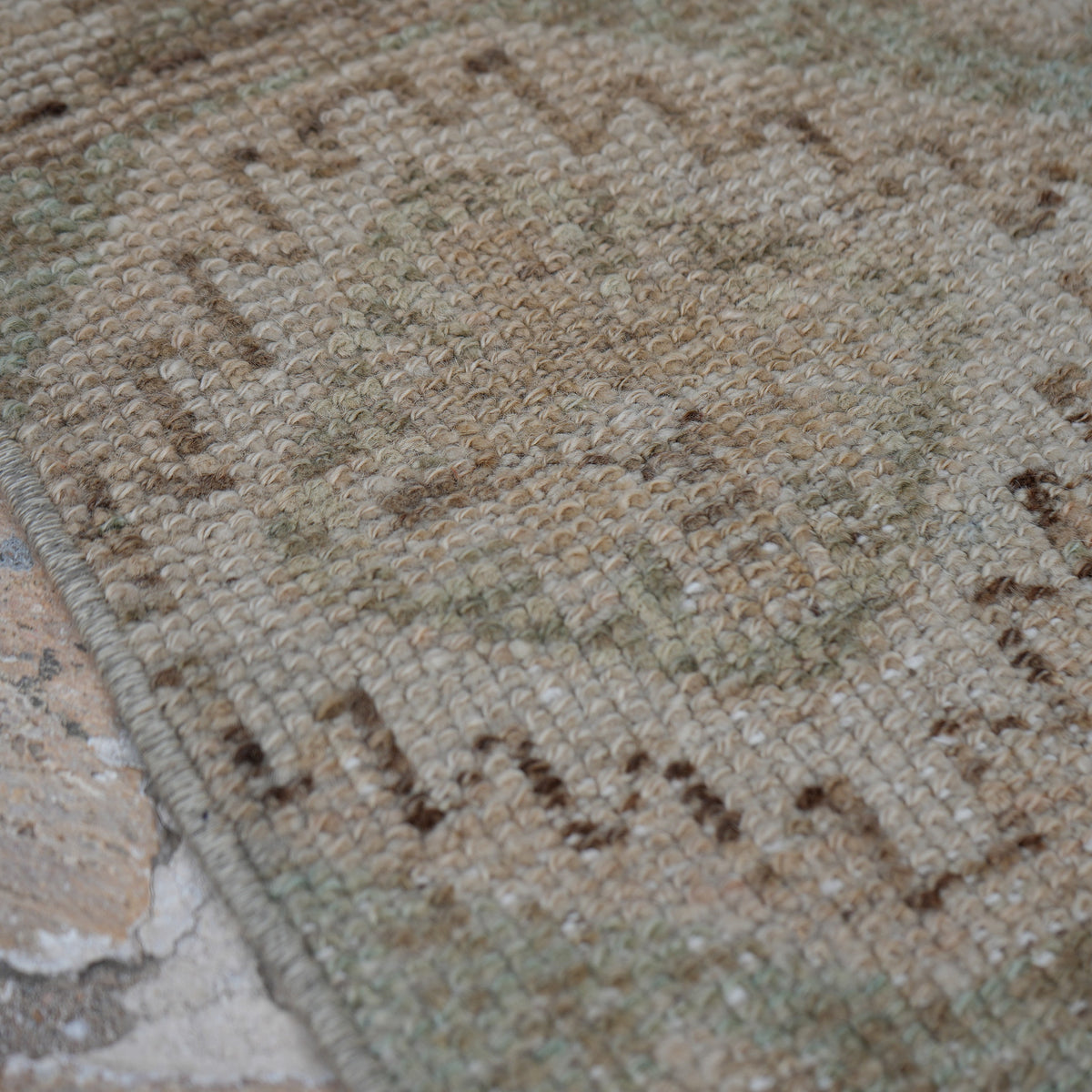 Beige 3' x 11' vintage Turkish runner rug in wool, shown on the floor.