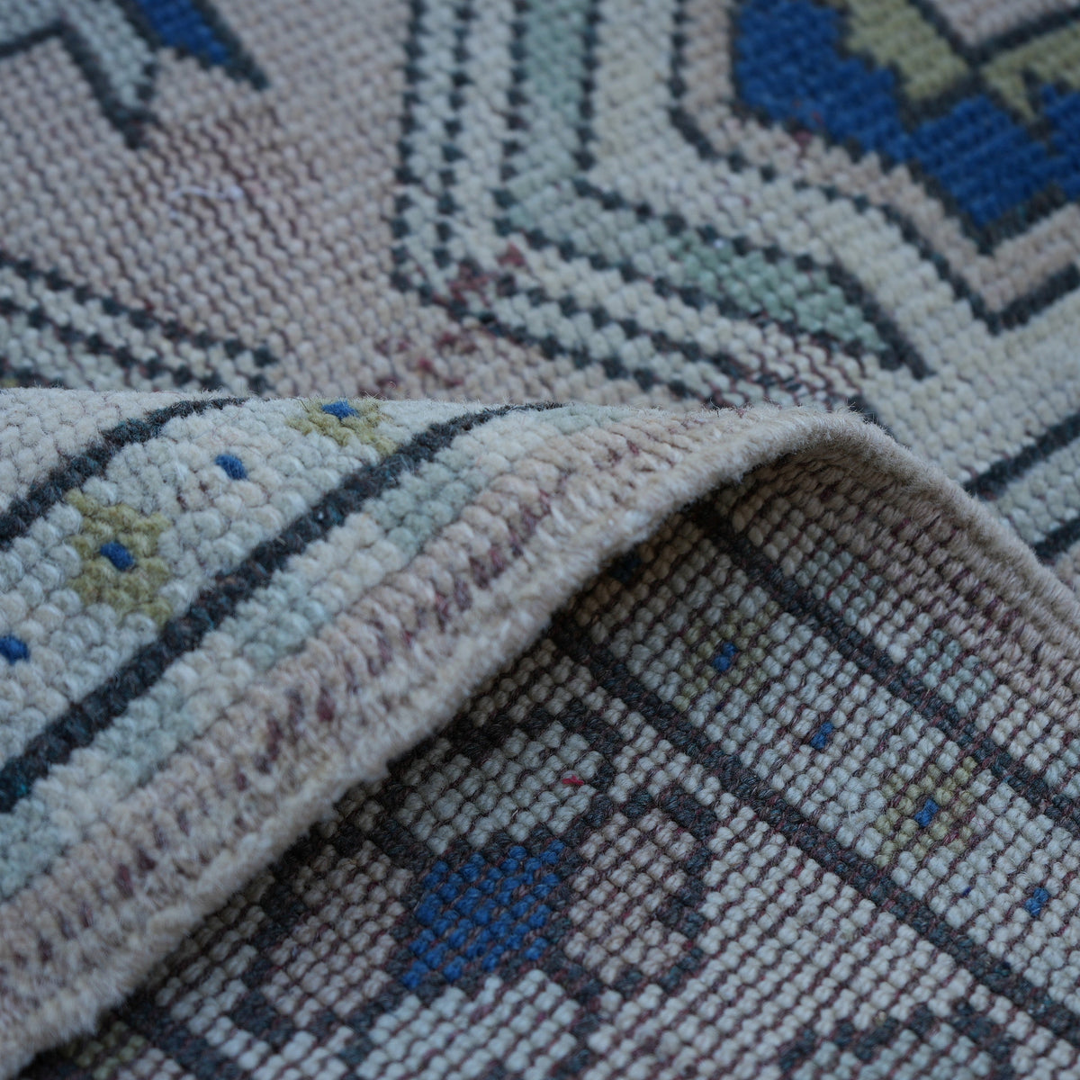 Additional view of the pale pink vintage Turkish runner rug, hand-knotted in wool.