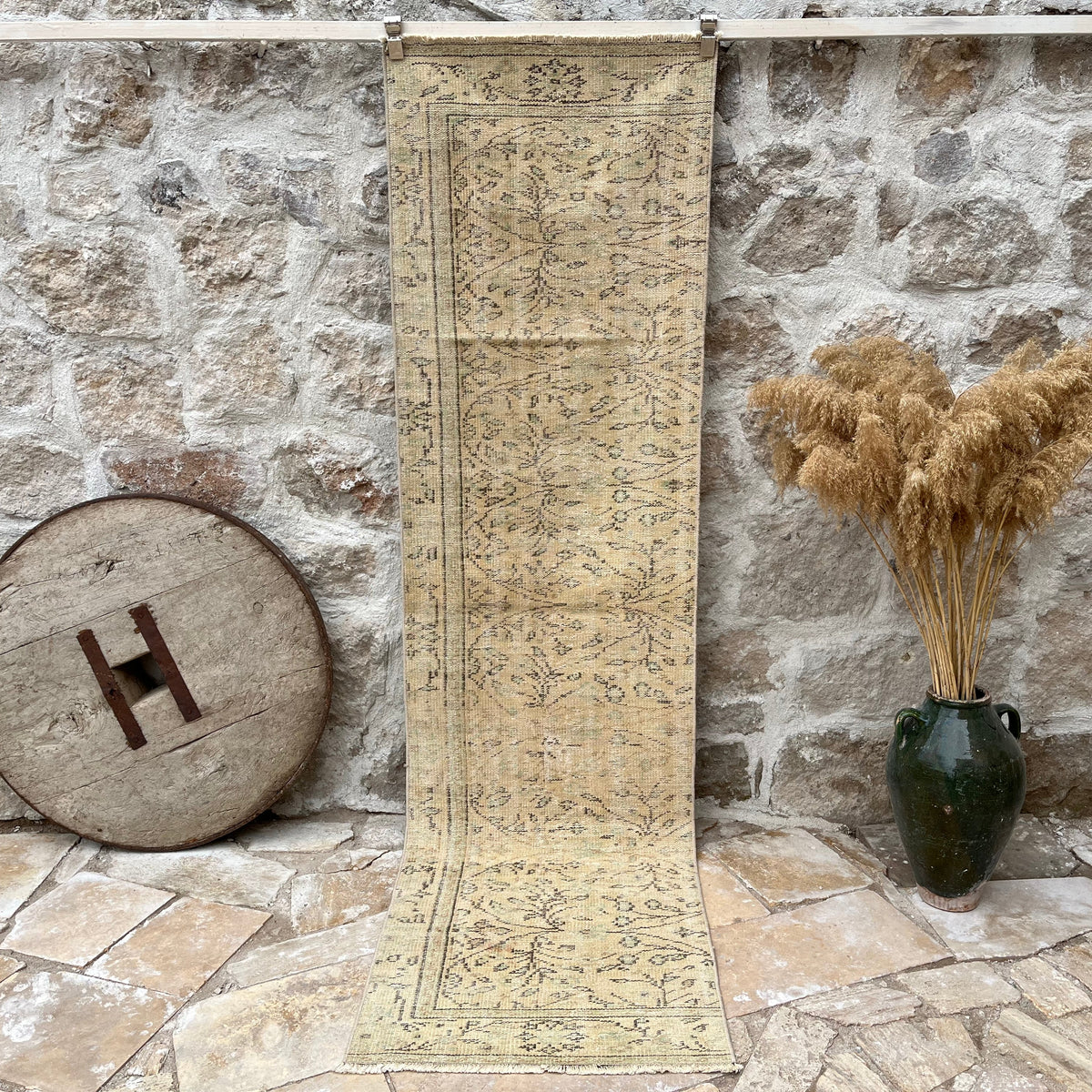 Beige 3' x 9' vintage runner rug with floral design, handmade in Turkey – Cleo.