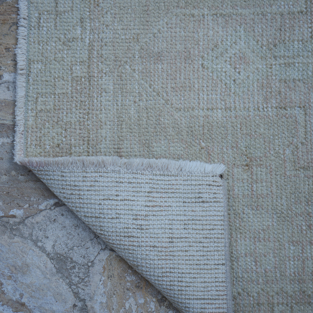 1970s pink vintage Turkish runner rug with traditional design, hand-knotted weave and low pile.