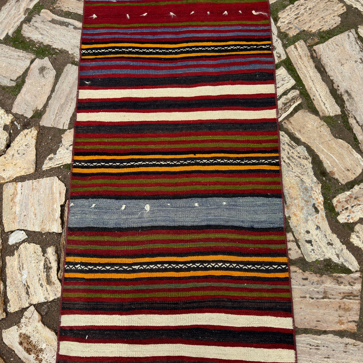 1970s red vintage Turkish striped runner rug with striped design, flatweave construction and low pile.