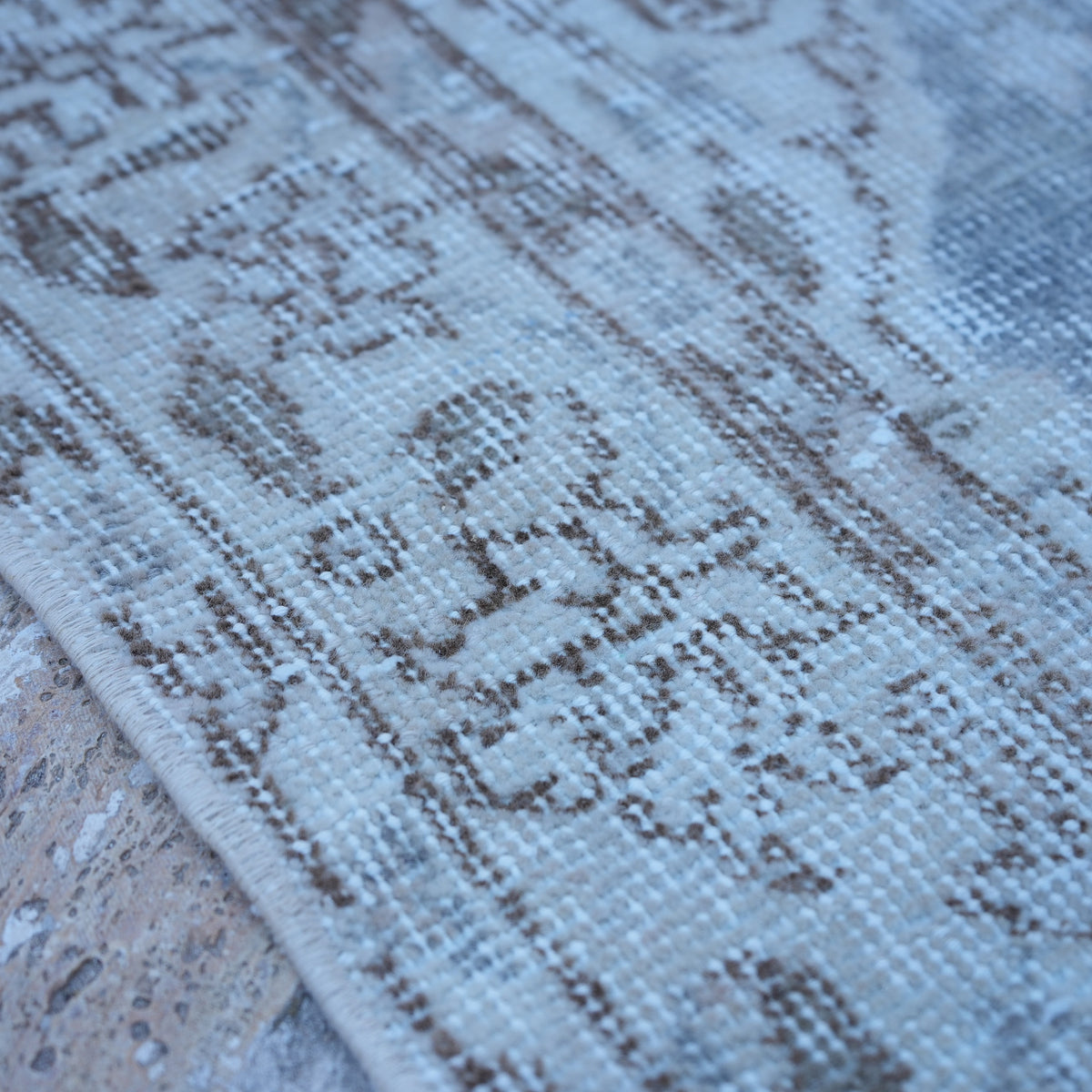 Blue 4' x 7' vintage Turkish traditional rug in wool and cotton, shown on the floor.