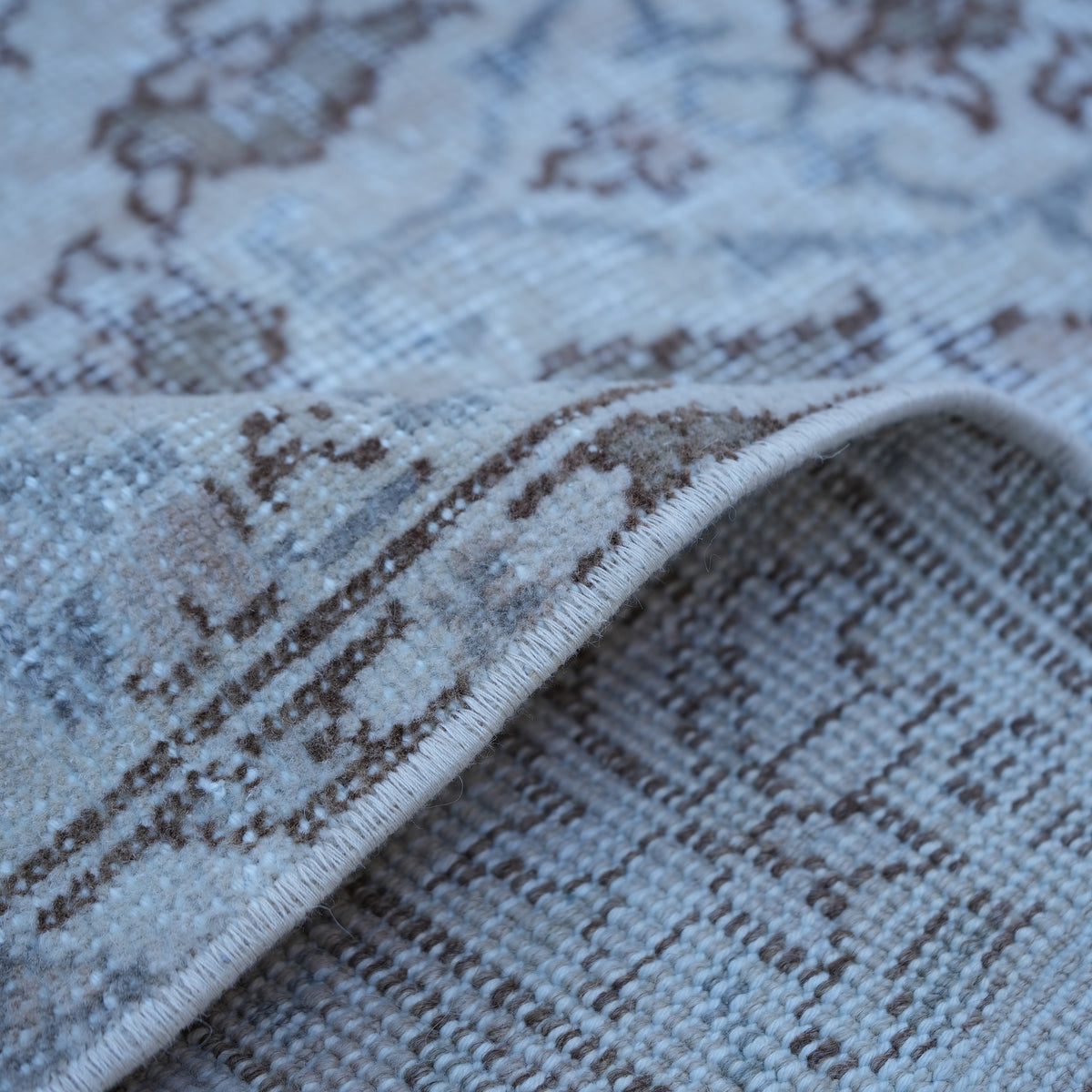Additional view of the blue vintage Turkish traditional rug, hand-knotted in wool and cotton.