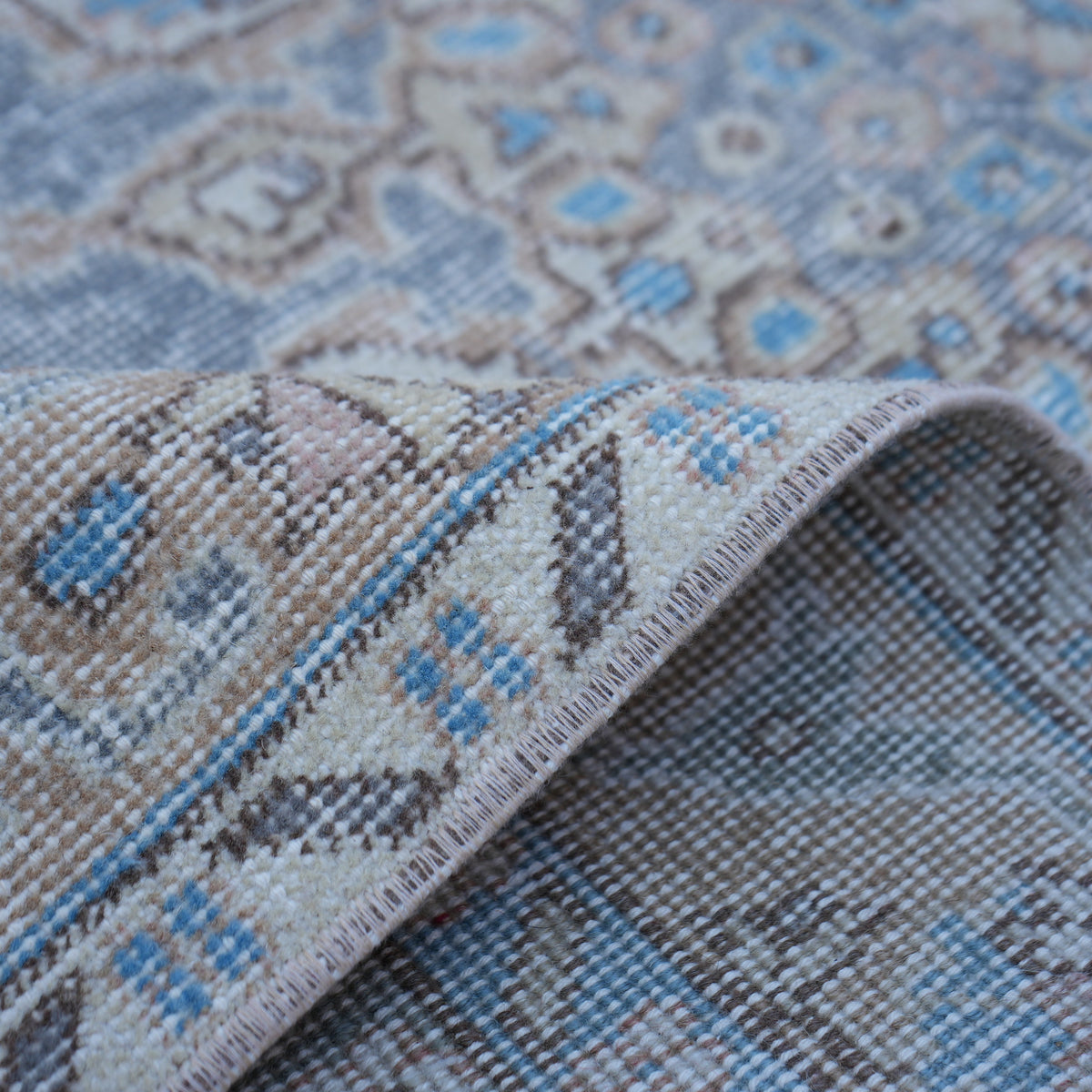 Additional view of the purple vintage Turkish traditional rug, hand-knotted in wool and cotton.
