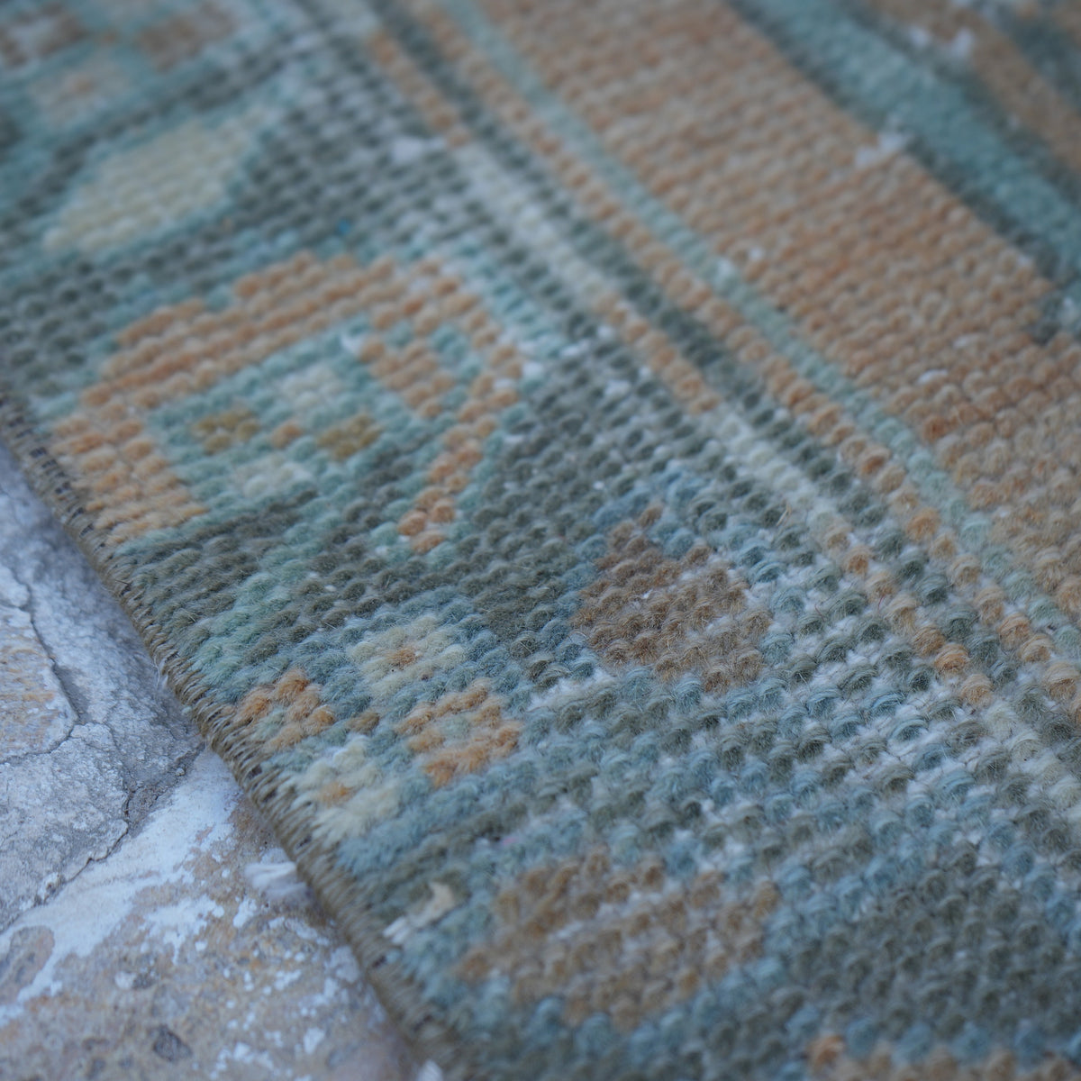 Orange 4' x 8' vintage Turkish traditional rug in wool and cotton, shown on the floor.