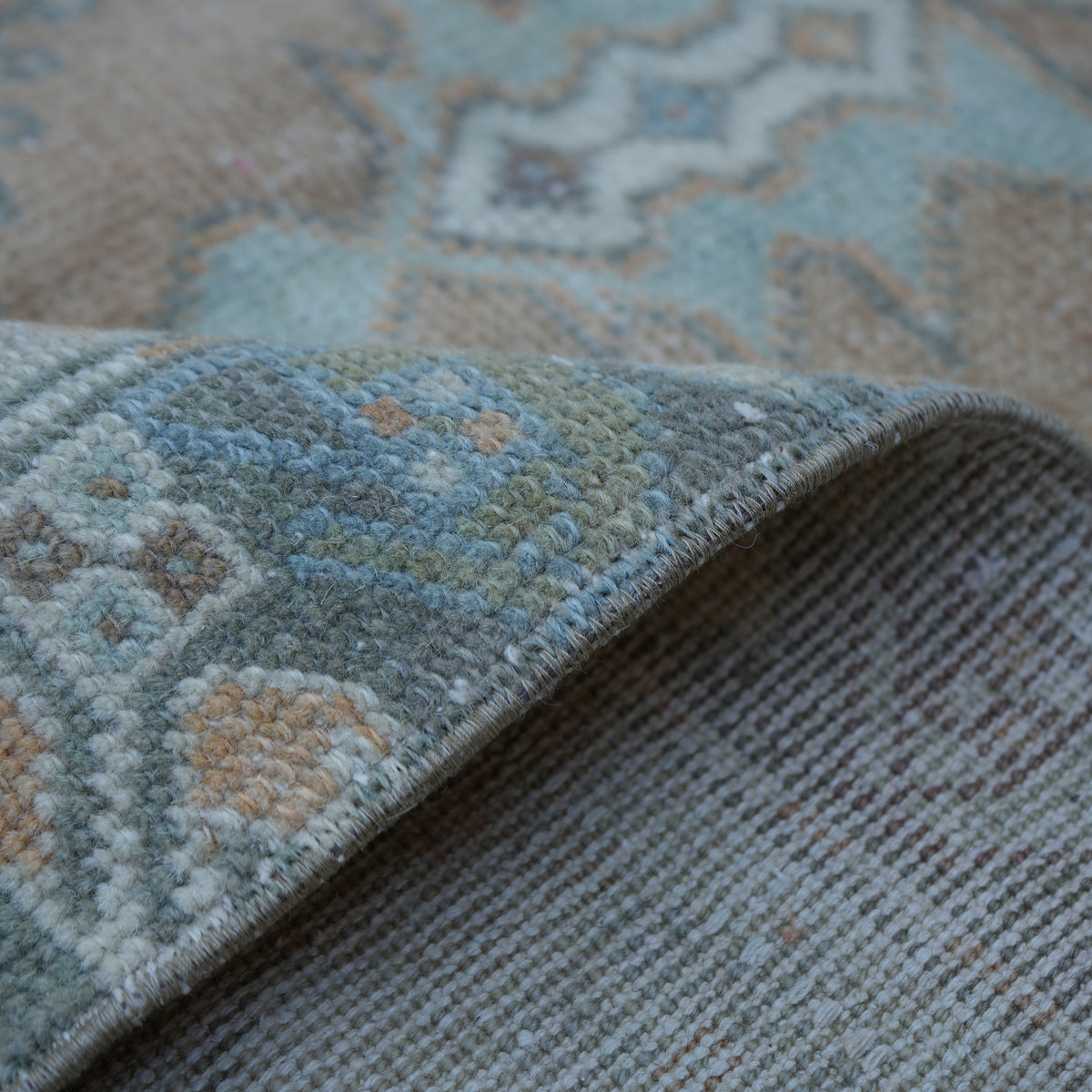 Additional view of the orange vintage Turkish traditional rug, hand-knotted in wool and cotton.