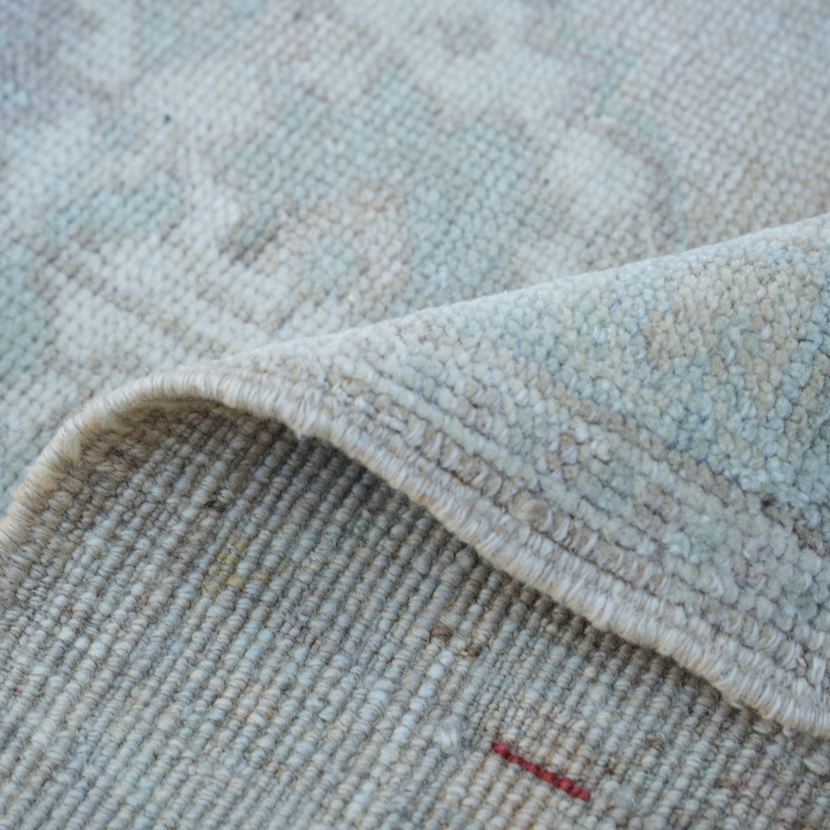 Additional view of the brown vintage turkish rug, hand-knotted in wool and cotton.