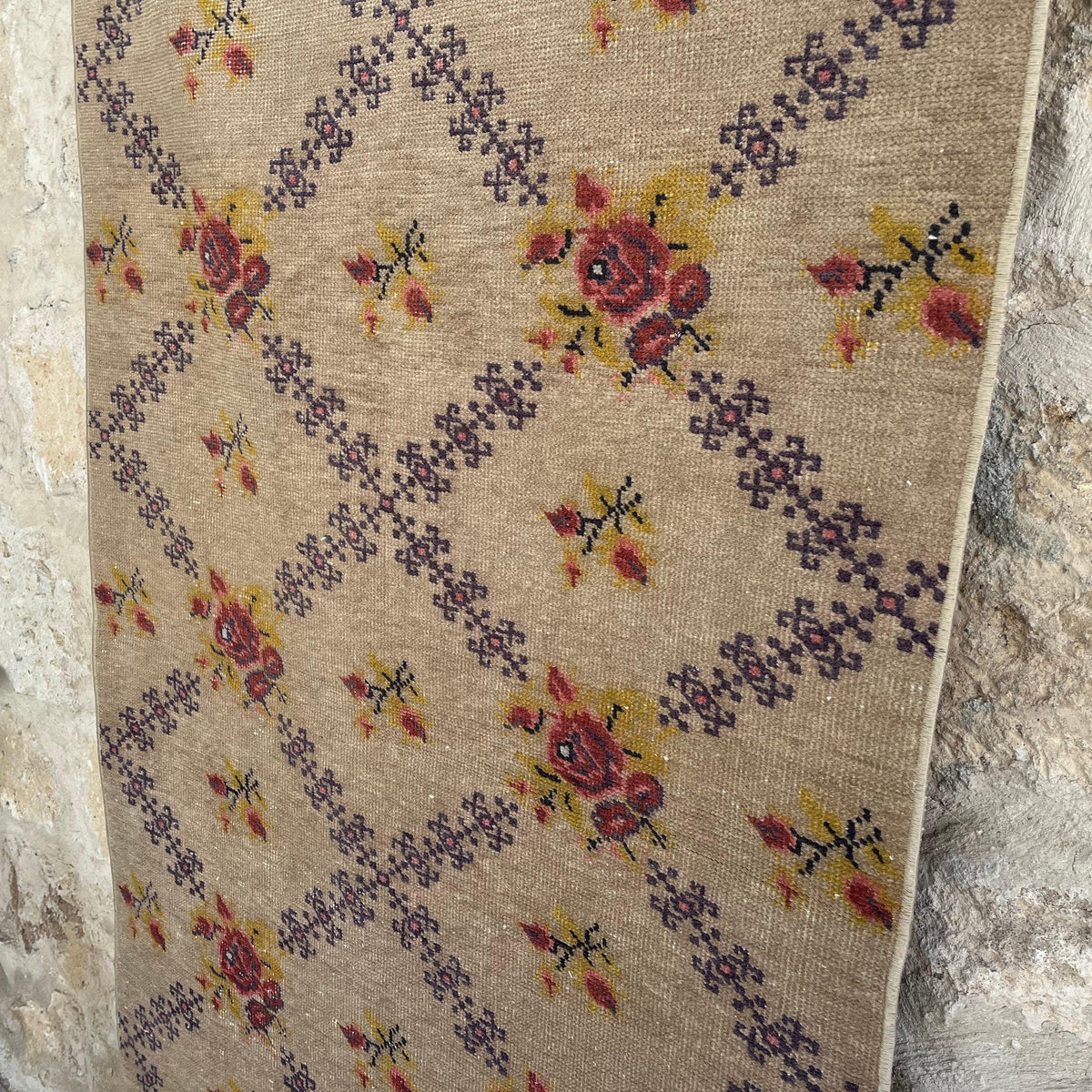 1970s brown vintage turkish rug with traditional design, hand-knotted weave and low pile.
