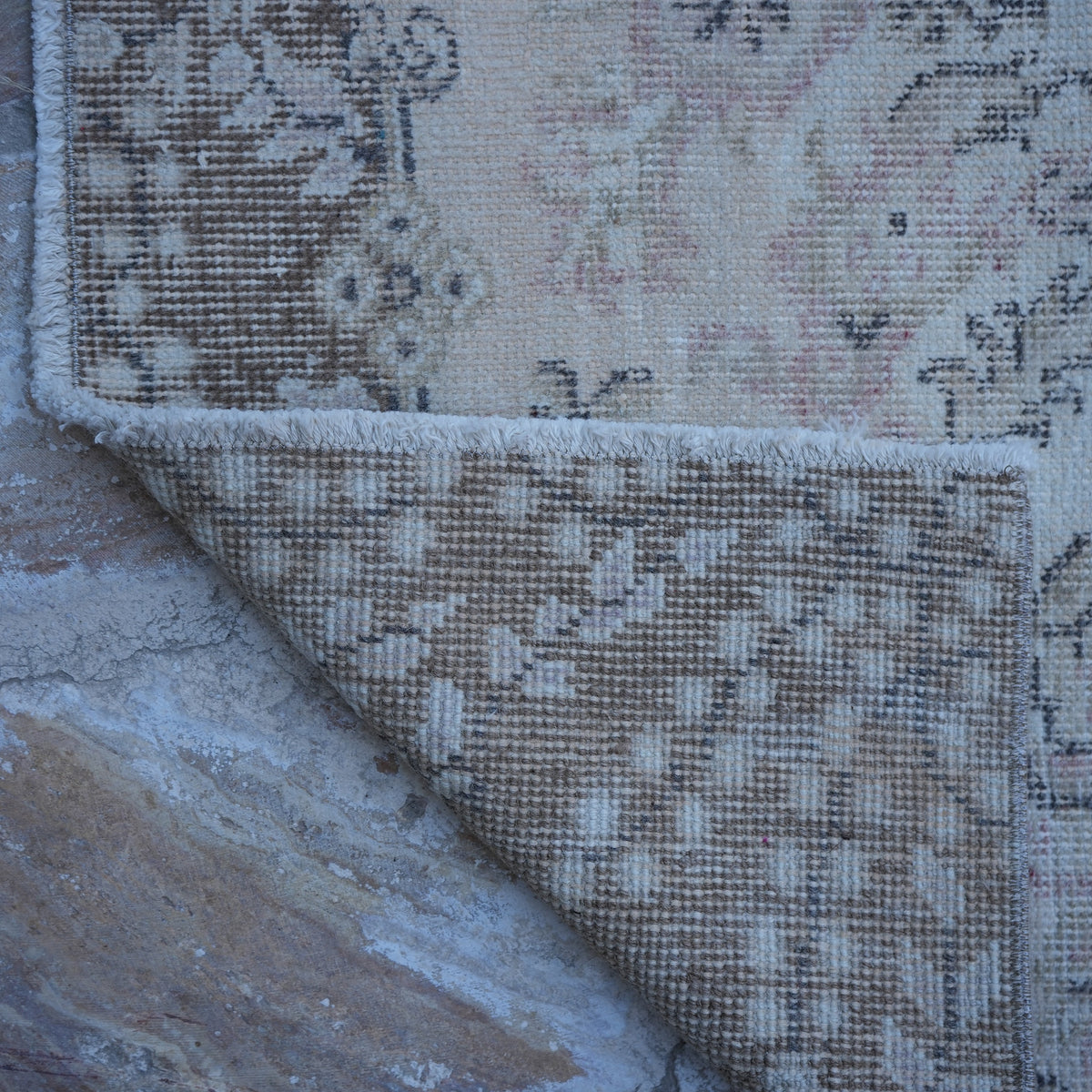 1970s beige vintage turkish rug with traditional design, hand-knotted weave and low pile.