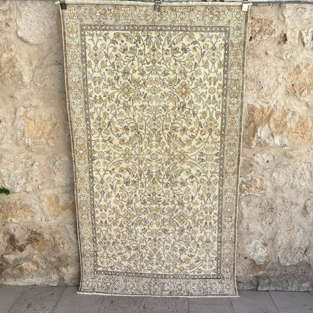Brown 4' x 7' vintage turkish rug with floral design, handmade in Turkey – Channing.