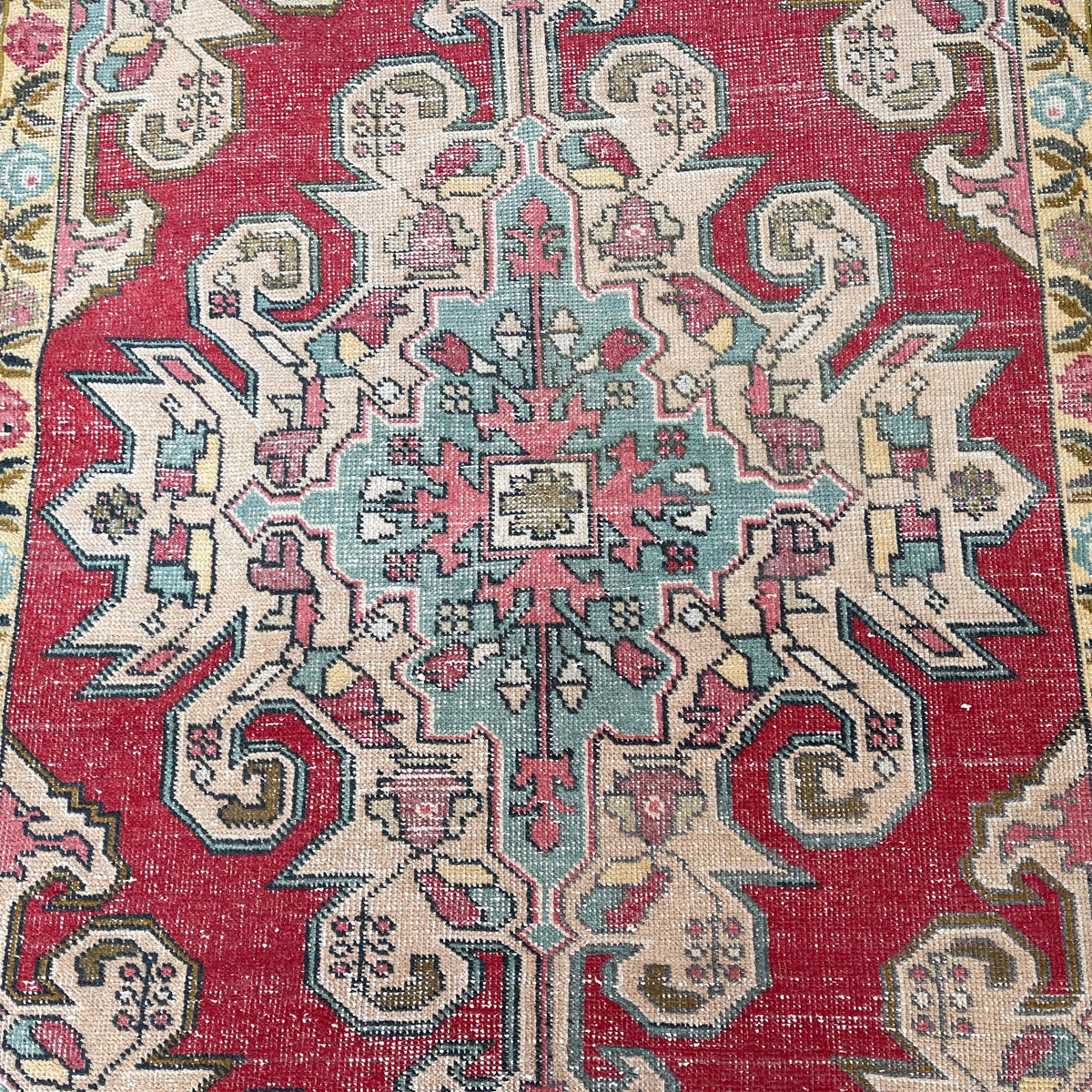 1970s yellow vintage turkish rug with geometric design, hand-knotted weave and low pile.