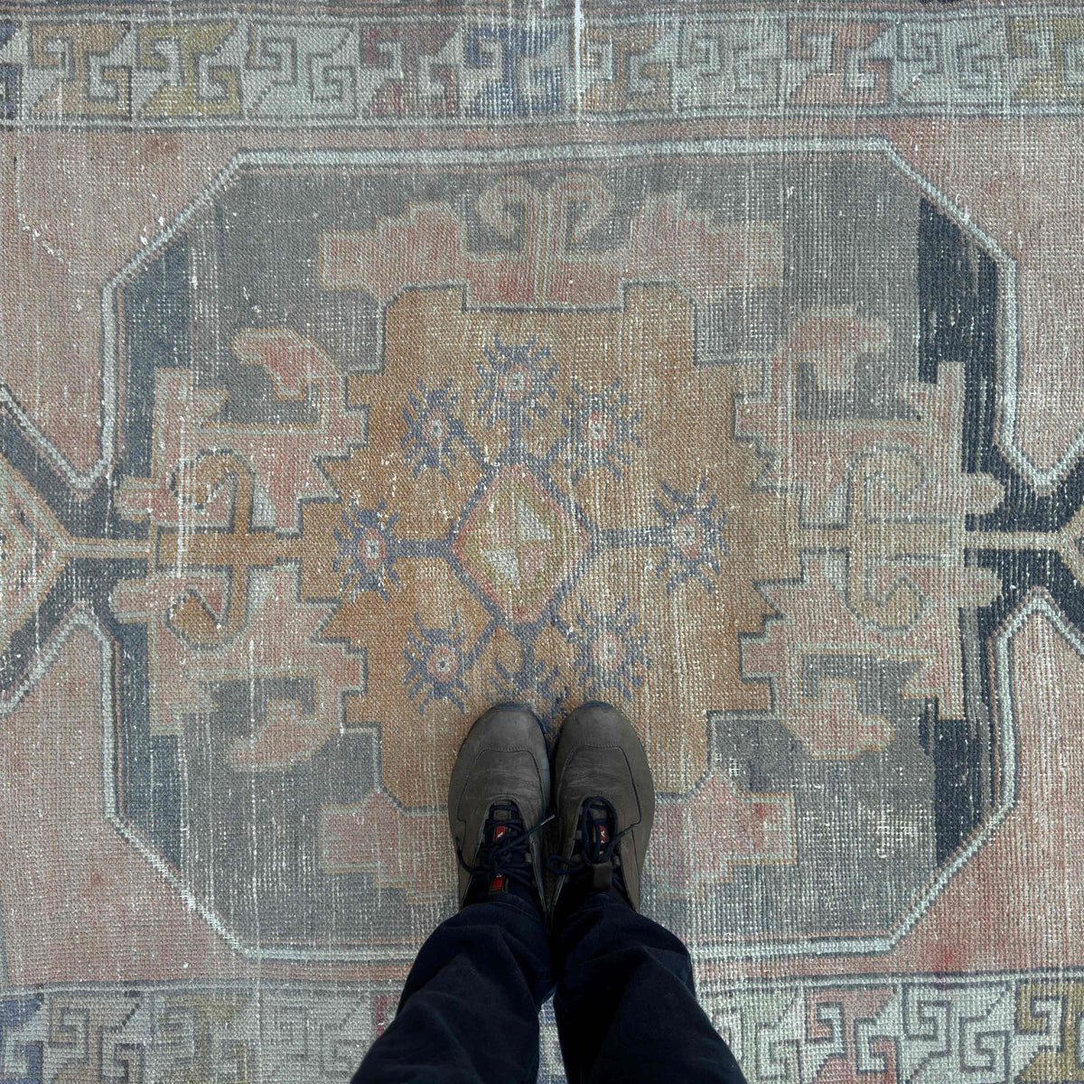 1970s beige vintage turkish rug with traditional design, hand-knotted weave and low pile.