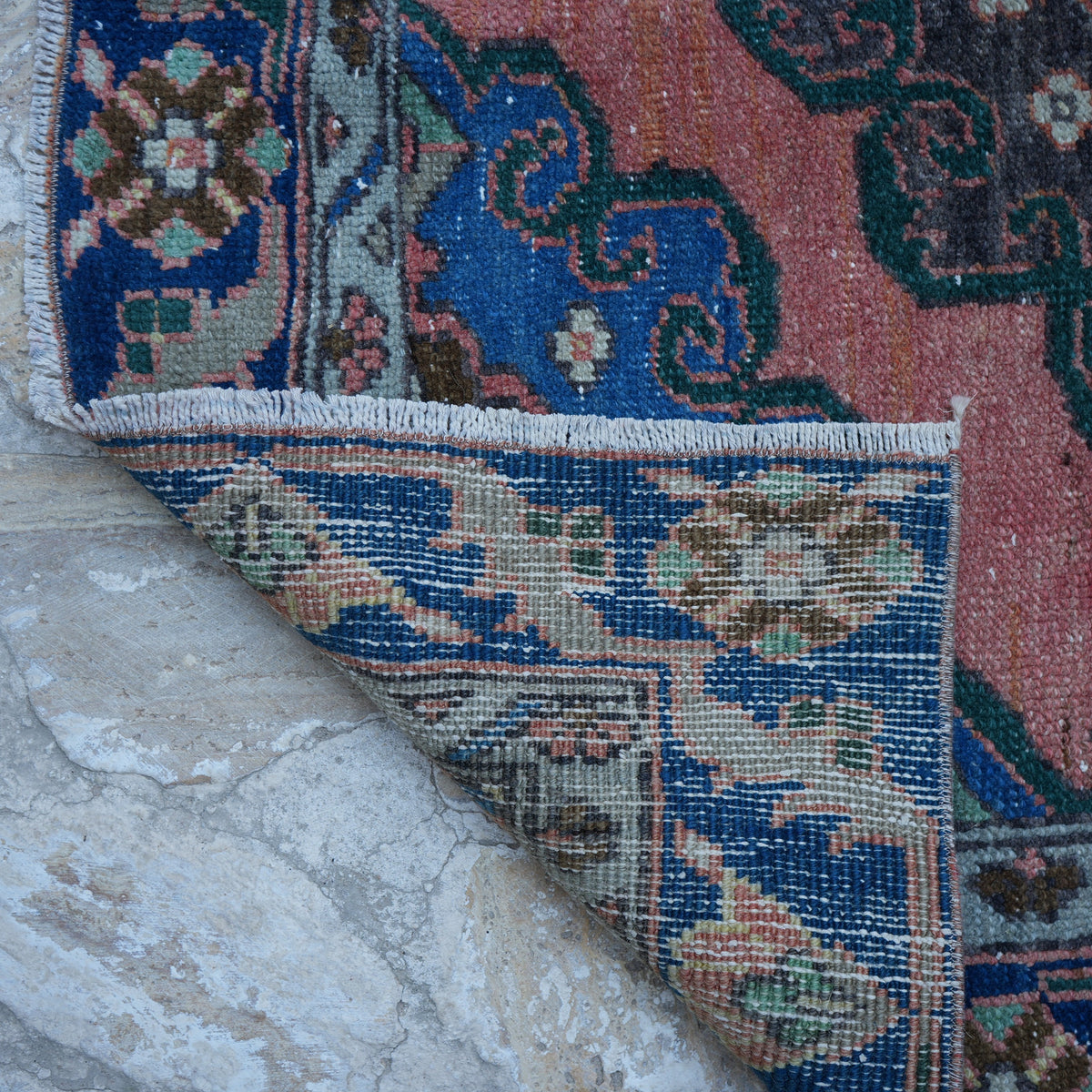 1970s orange vintage turkish rug with traditional design, hand-knotted weave and low pile.