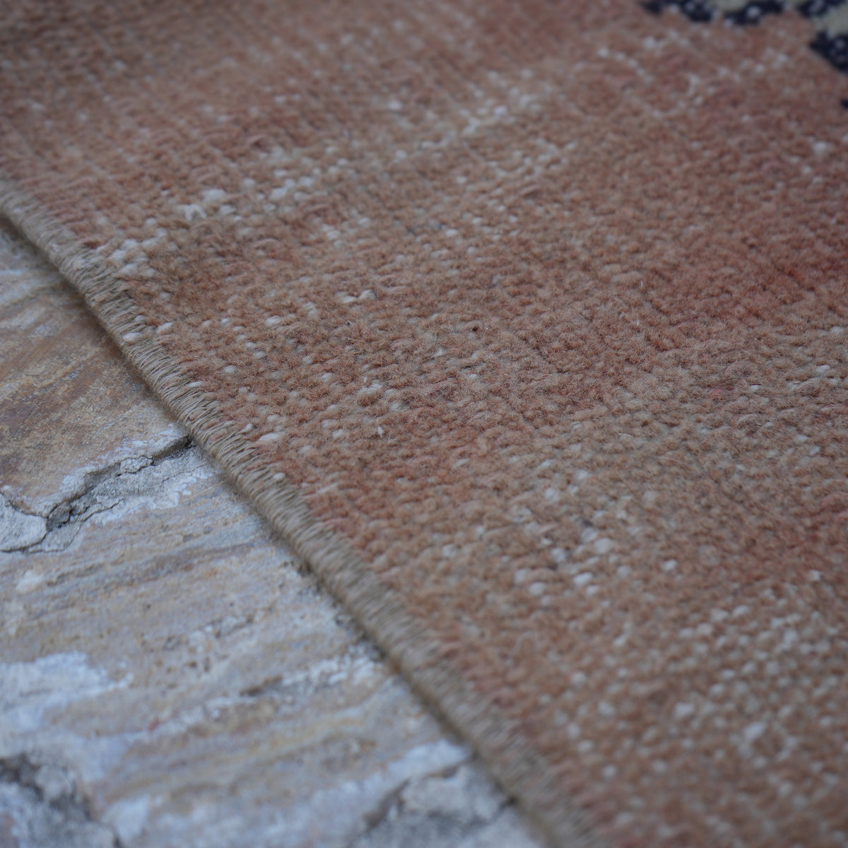 Orange 4' x 8' vintage turkish rug in wool and cotton, shown on the floor.