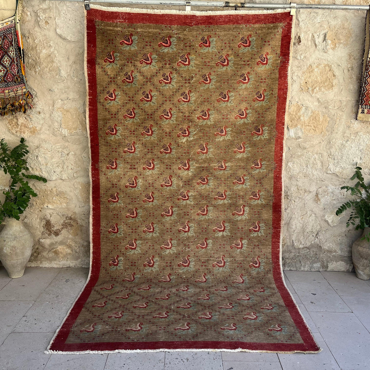 Brown 5' x 9' vintage turkish rug with floral design, handmade in Turkey – Fisk.