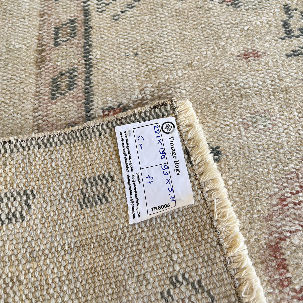 1970s beige vintage turkish rug with medallion design, hand-knotted weave and low pile.
