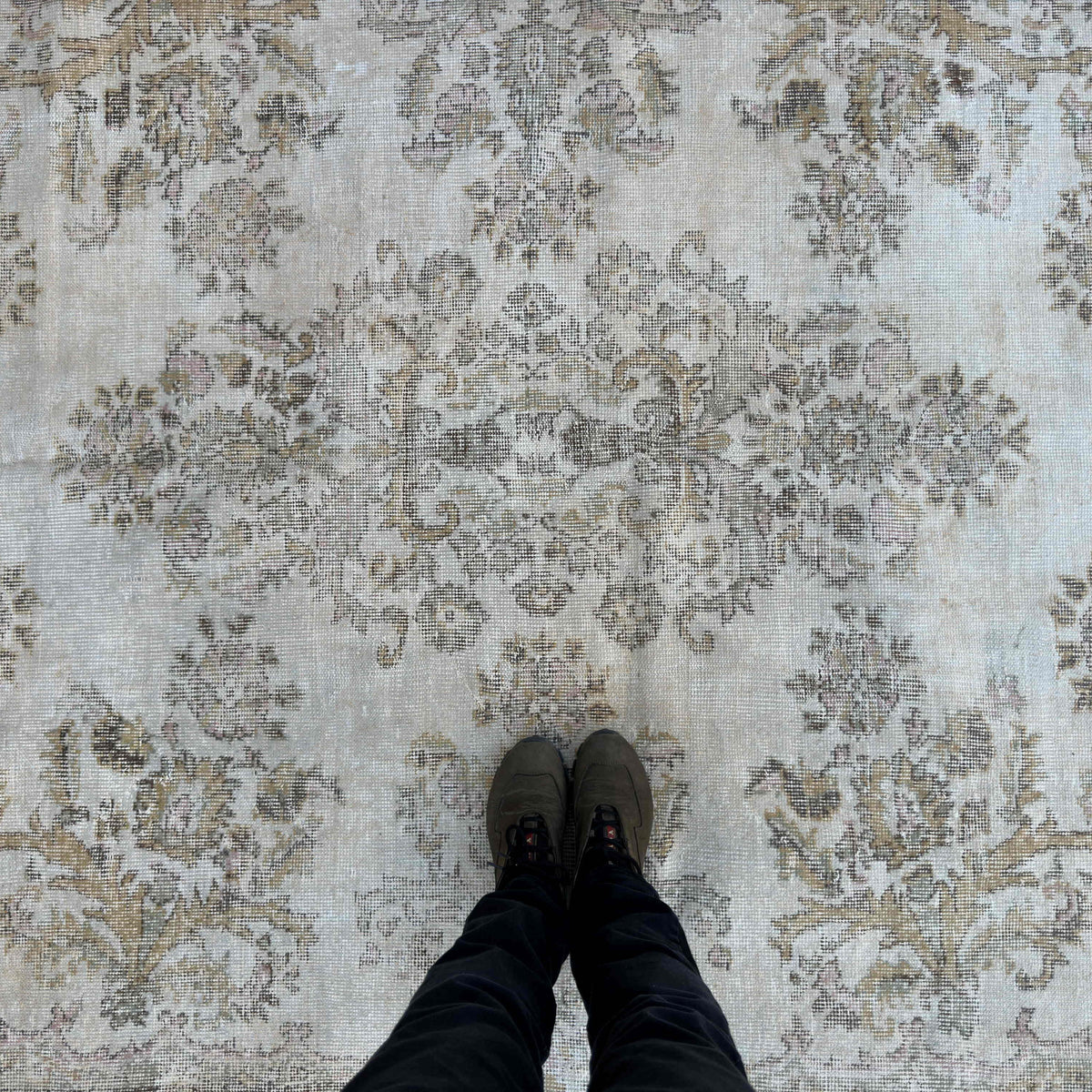 1970s beige vintage turkish rug with traditional design, hand-knotted weave and low pile.