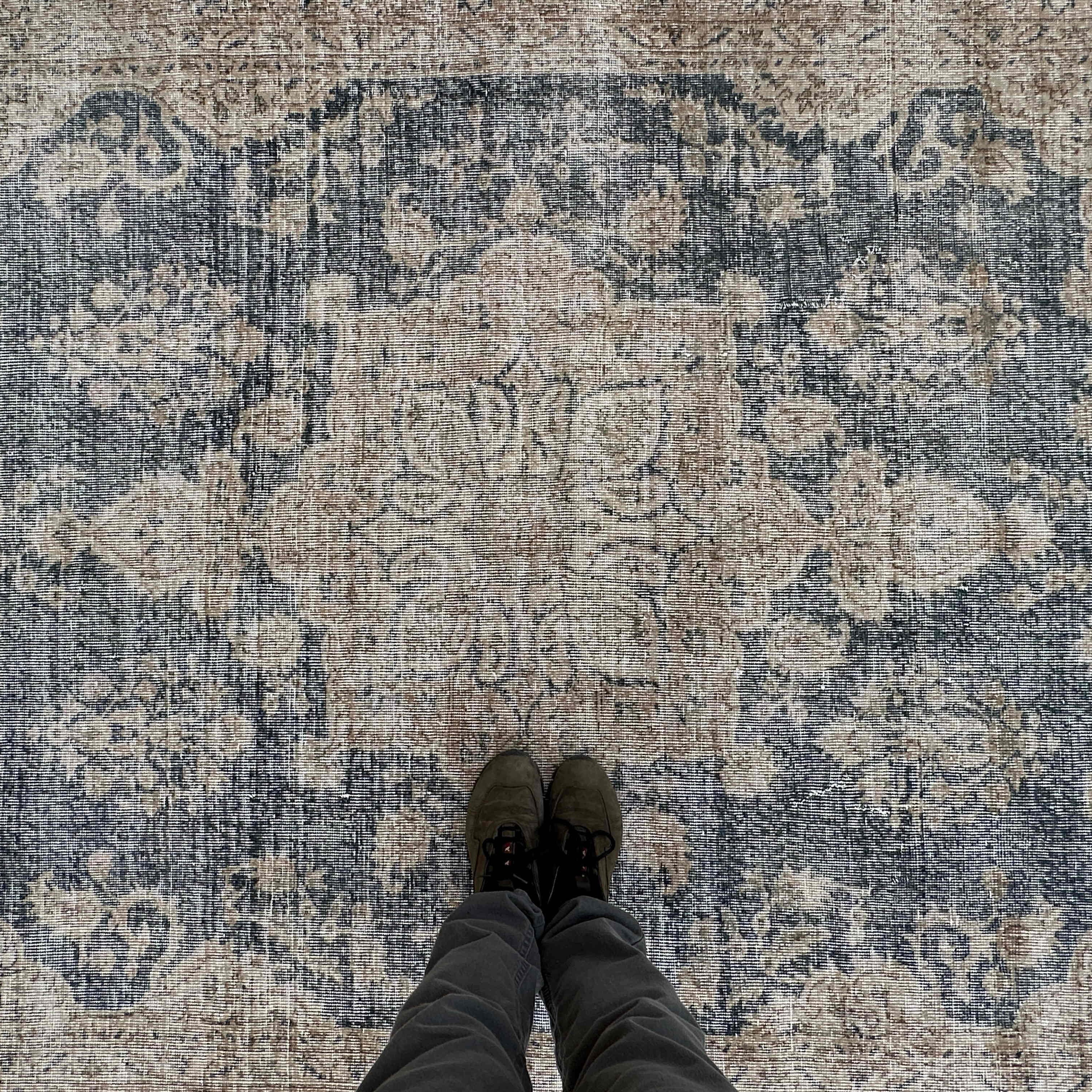 1970s blue vintage turkish rug with medallion design, hand-knotted weave and low pile.