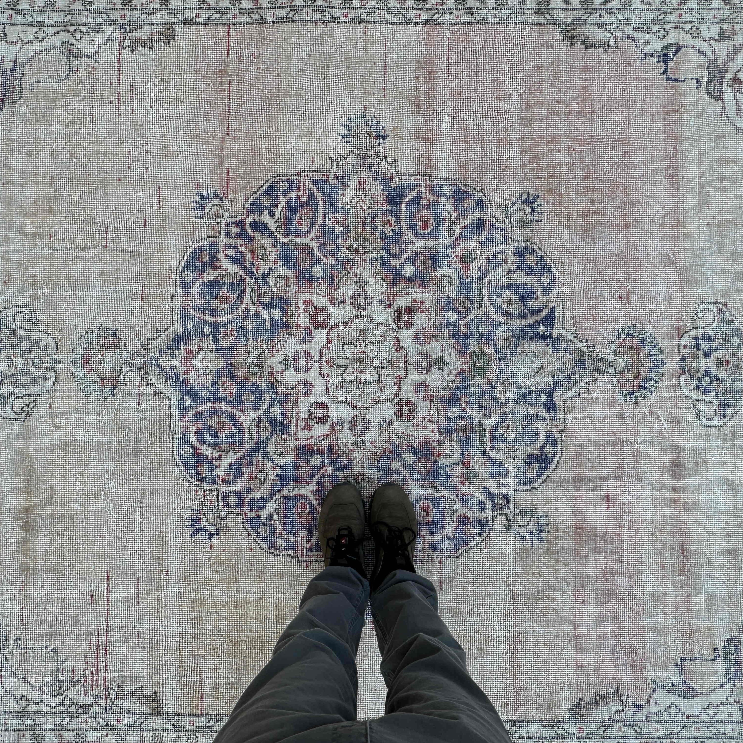 1970s beige vintage turkish rug with medallion design, hand-knotted weave and low pile.