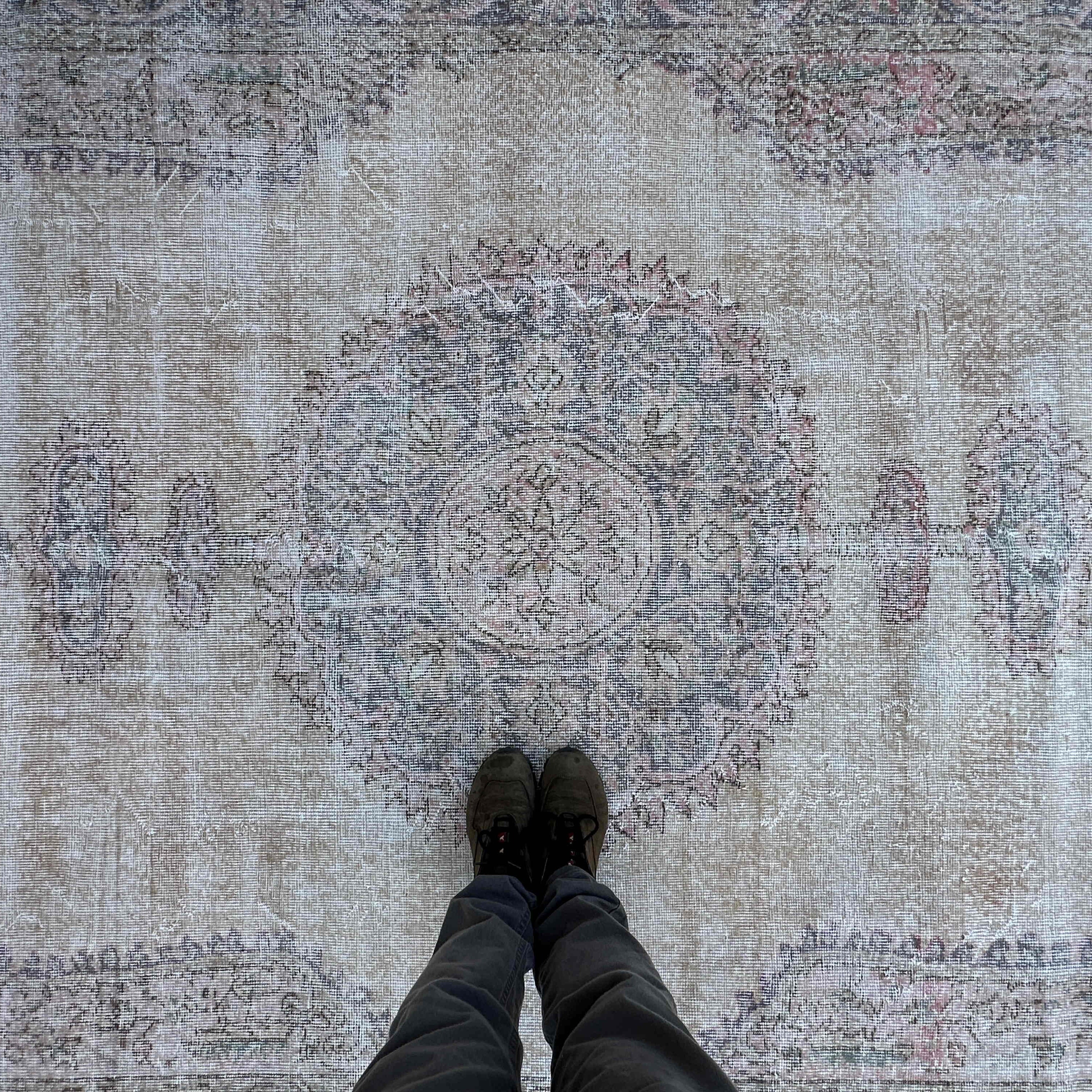 1970s blue vintage turkish rug with medallion design, hand-knotted weave and low pile.